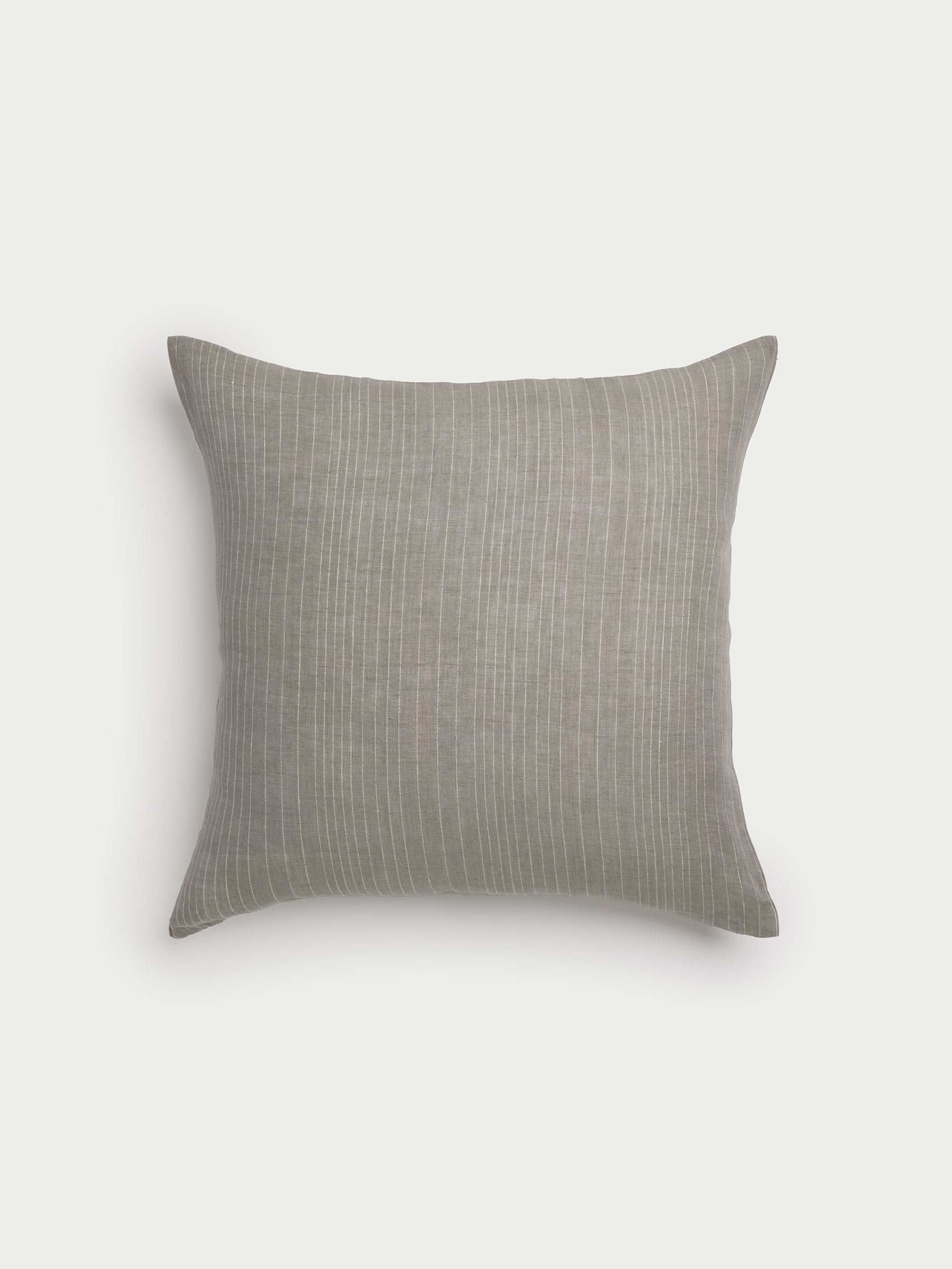 Cozy Earth striped throw pillow with plain white background 