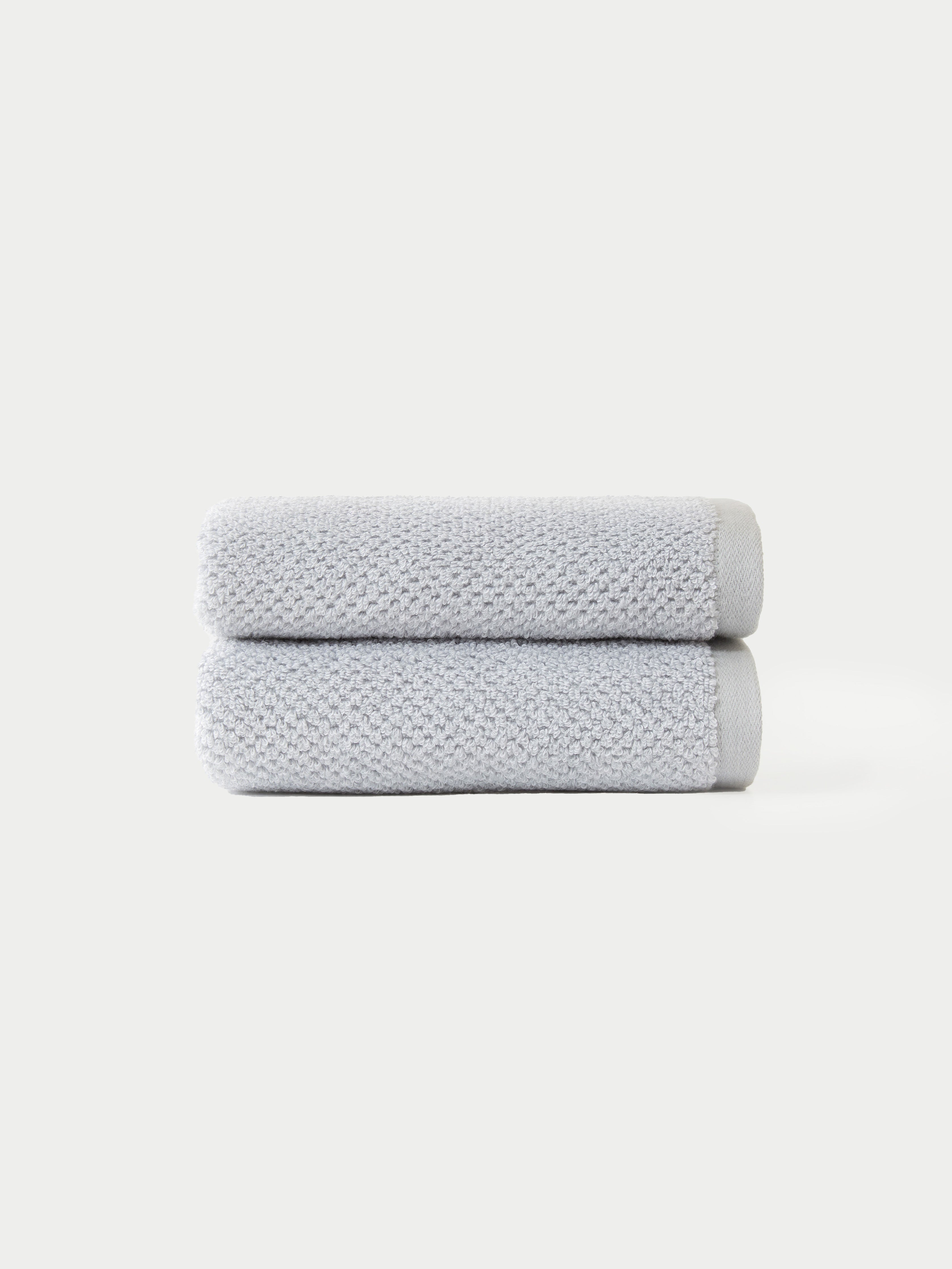 Nantucket Hand Towels in the color Heathered Harbor Mist. The Hand Towels are neatly folded. The photo of the Hand Towels was taken with a white background.|Color:Heathered Harbor Mist