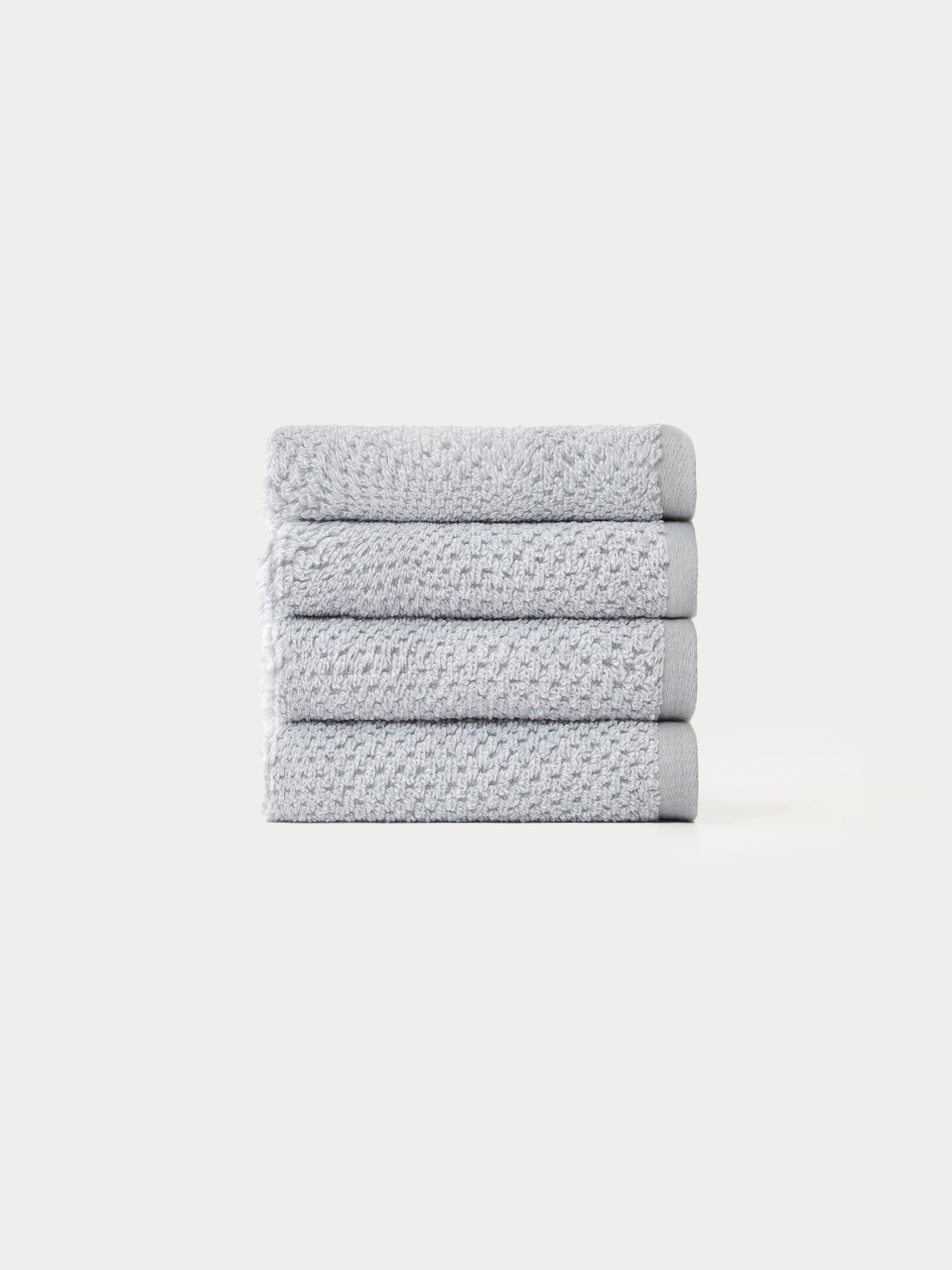 Nantucket Wash Cloths in the color Heathered Harbor Mist. The Wash Cloths are neatly folded. The photo of the wash cloths was taken with a white background.