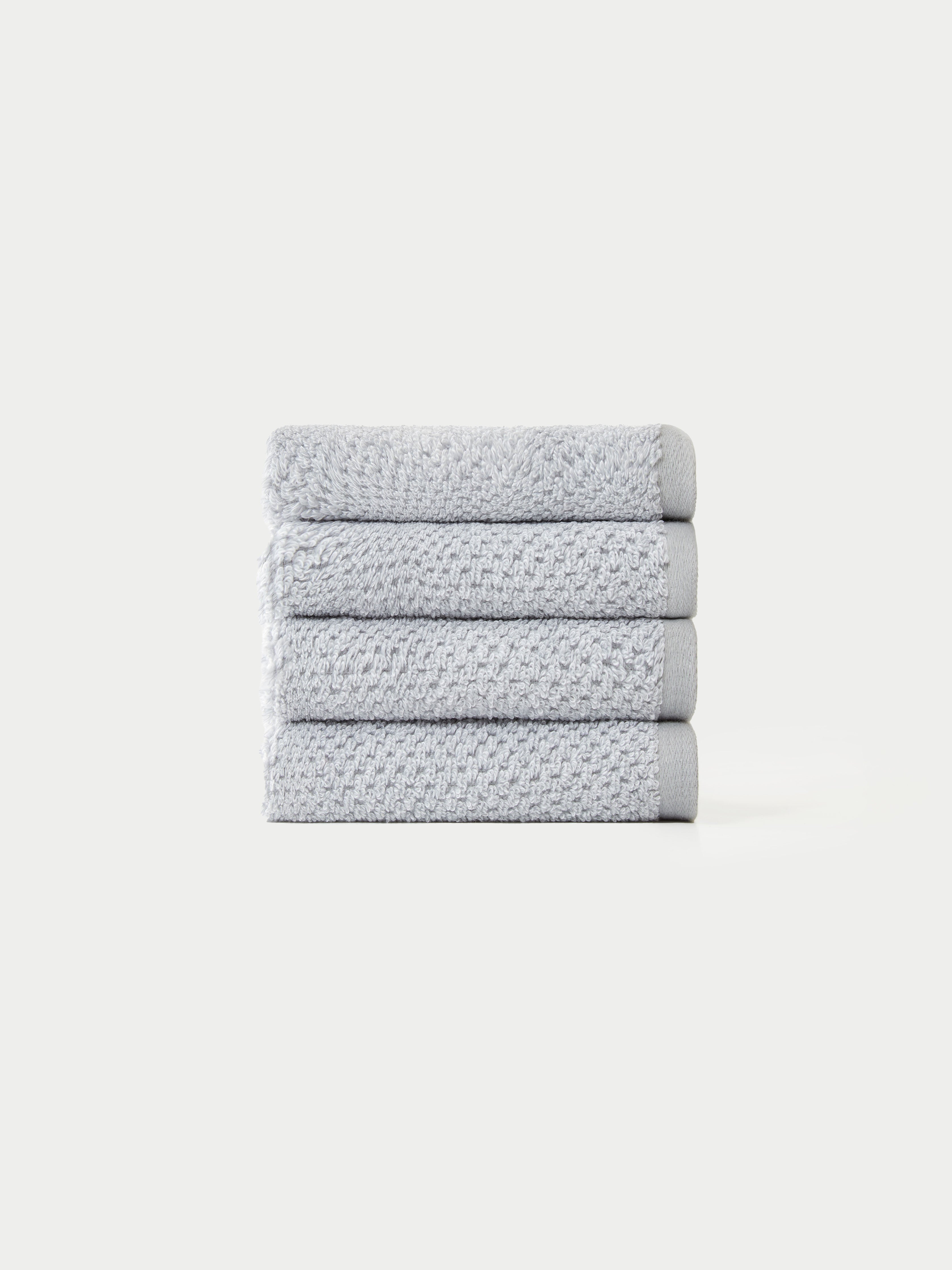 Nantucket Wash Cloths in the color Heathered Harbor Mist. The Wash Cloths are neatly folded. The photo of the wash cloths was taken with a white background.|Color:Heathered Harbor Mist