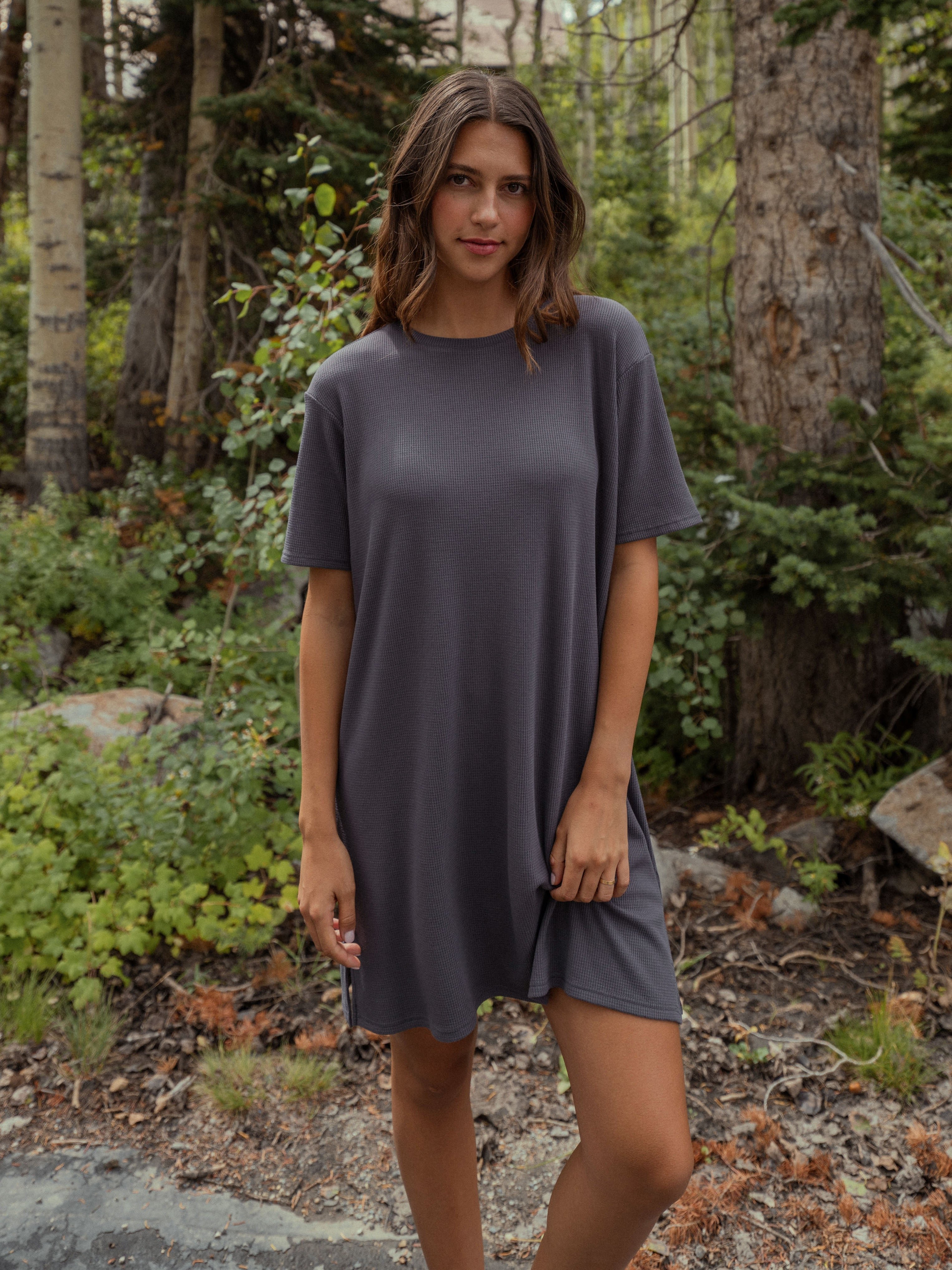 Women standing in a forest, wearing a Waffle Knit Dress|Color:Iron
