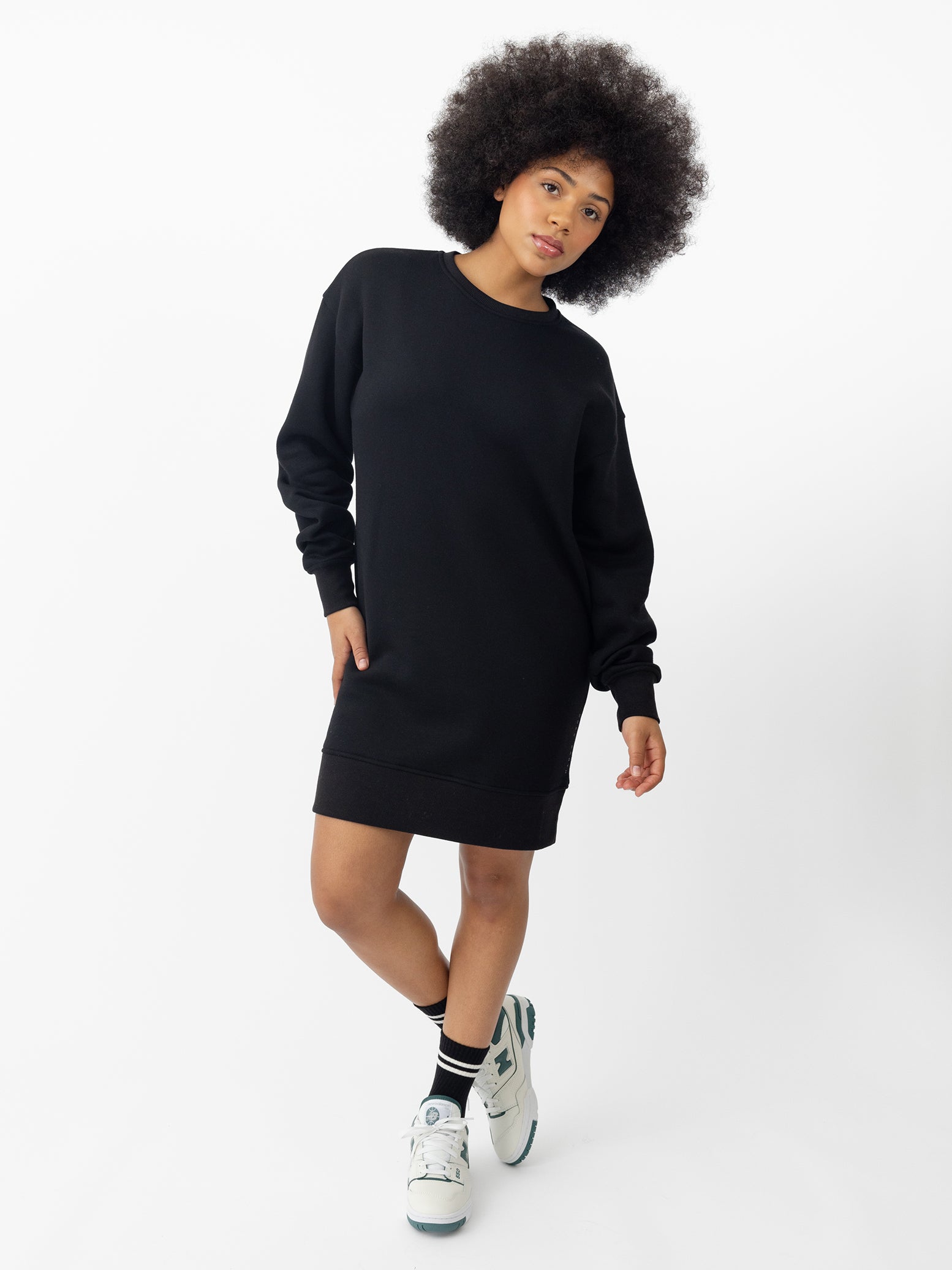 Woman wearing Black CityScape Crewneck Dress with white background |Color: Black
