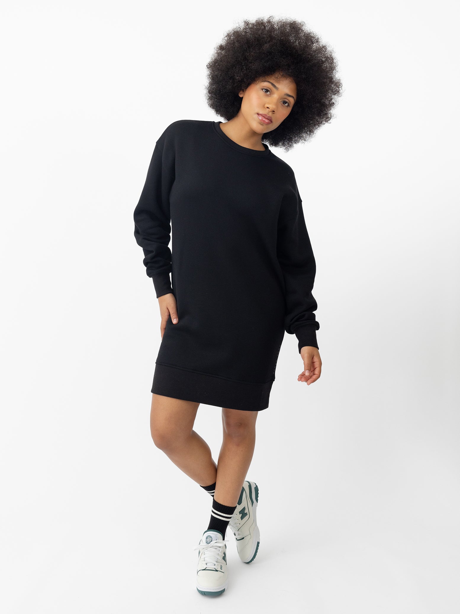 Woman wearing Black CityScape Crewneck Dress with white background 