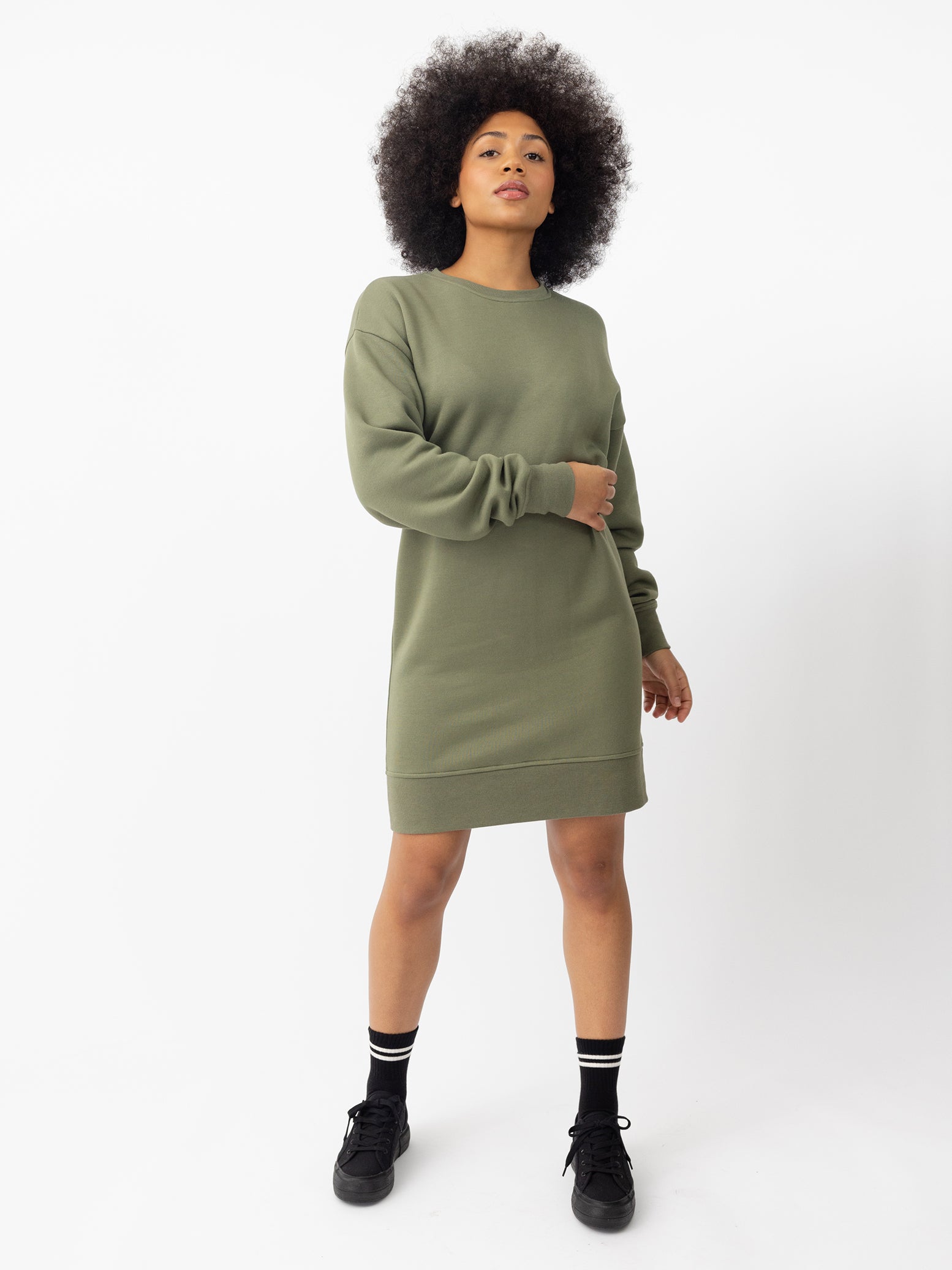 Woman wearing Juniper CityScape Crewneck Dress with white background 