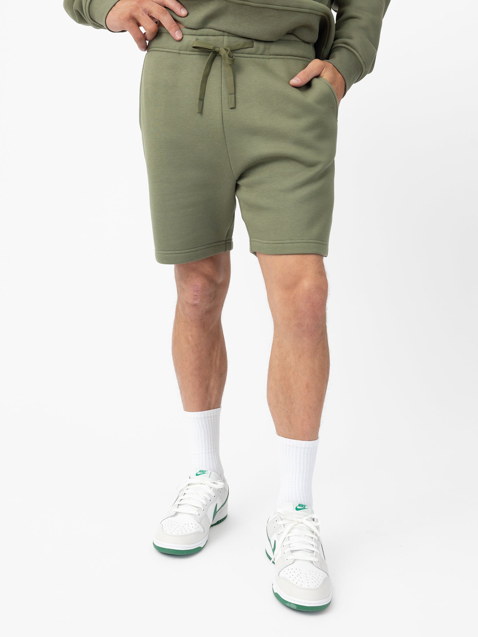 Man wearing Juniper CityScape Shorts with white background 