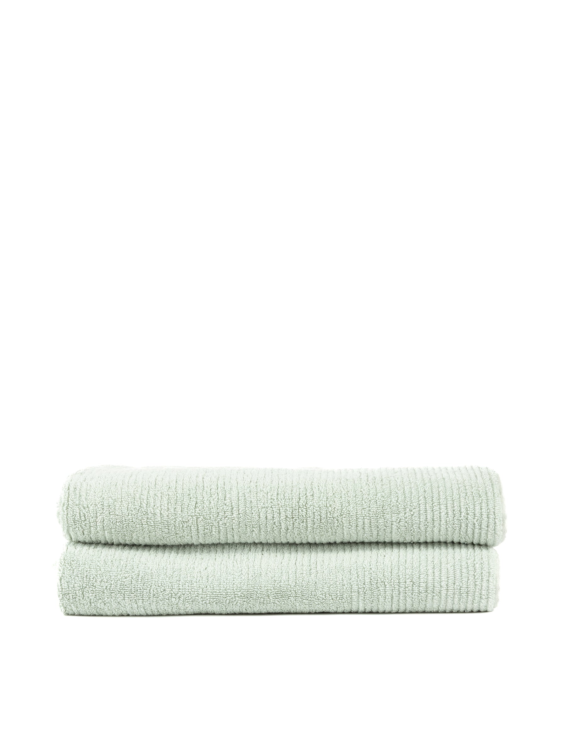 Two folded Ribbed Terry Bath Sheets by Cozy Earth, in a light green hue, are stacked on top of each other against a white background. These towels feature a textured appearance and look soft and plush. |Color:Laurel