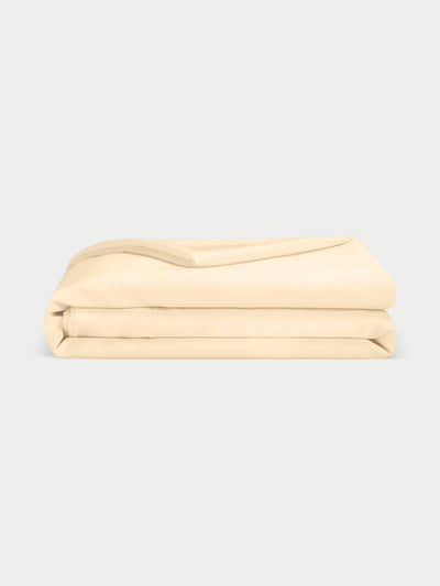 Lemonade Bamboo Duvet Cover neatly folded. Photo taken with white background. |Color: Lemonade