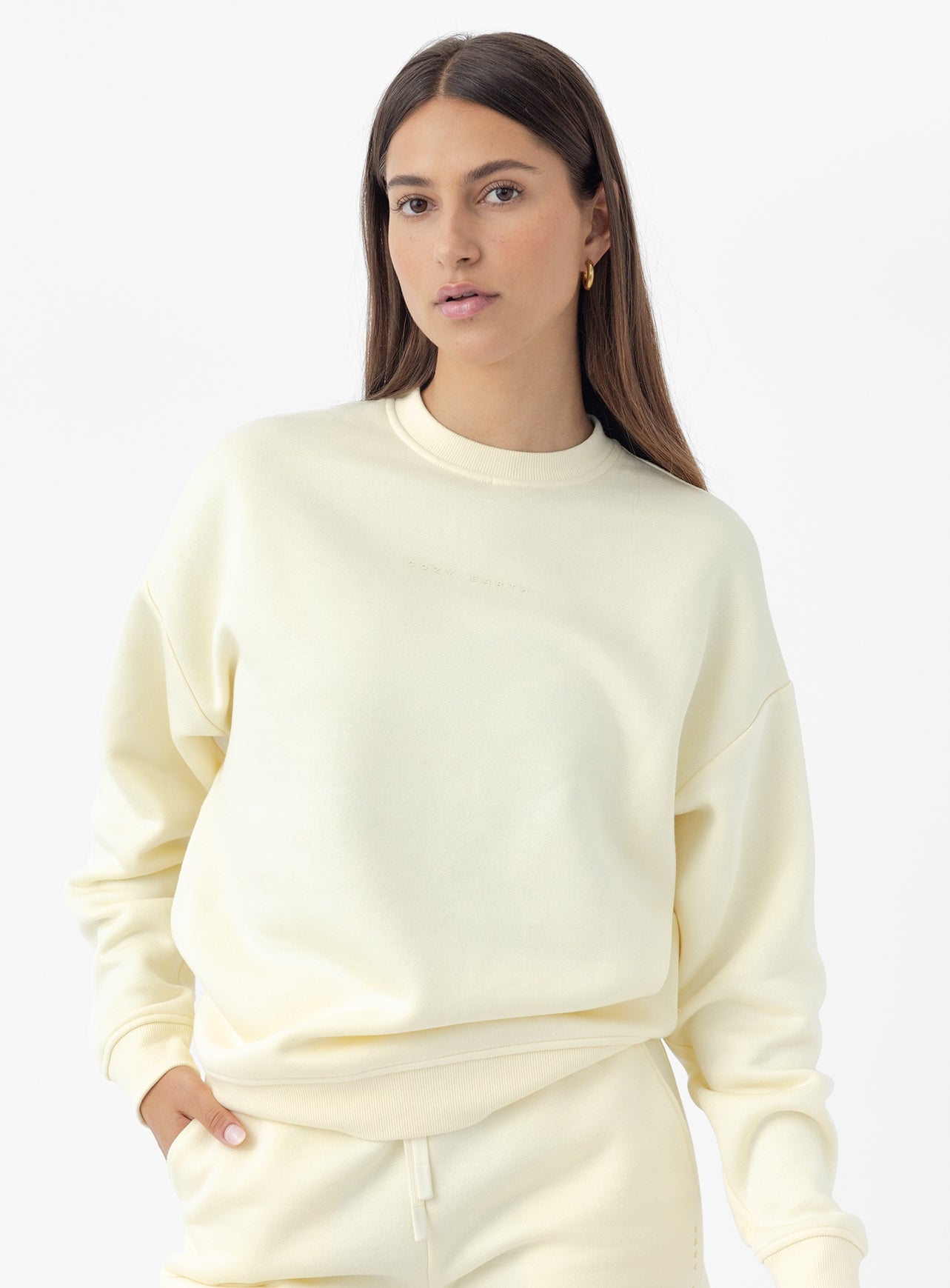 Woman wearing lemonade cityscape pullover |Color:Lemonade