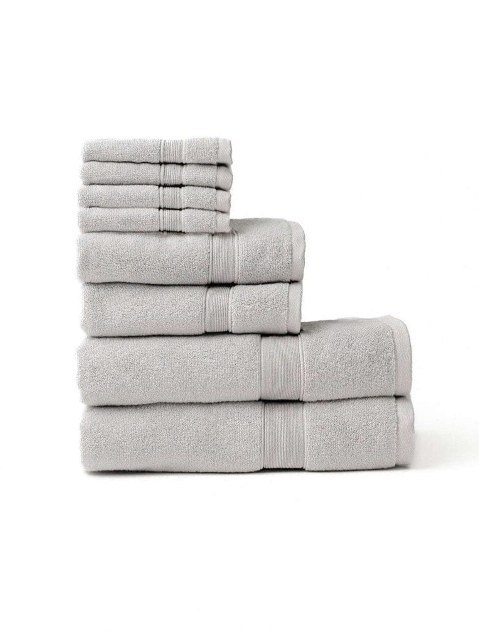 Light grey luxe bath towel set folded with white background 