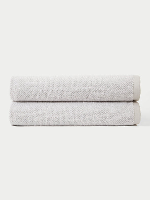 Nantucket Bath Sheets in the color Heathered Light Grey. The bath sheets are neatly folded. The photo of the bath sheets was taken with a white background.|Color:Heathered Light Grey