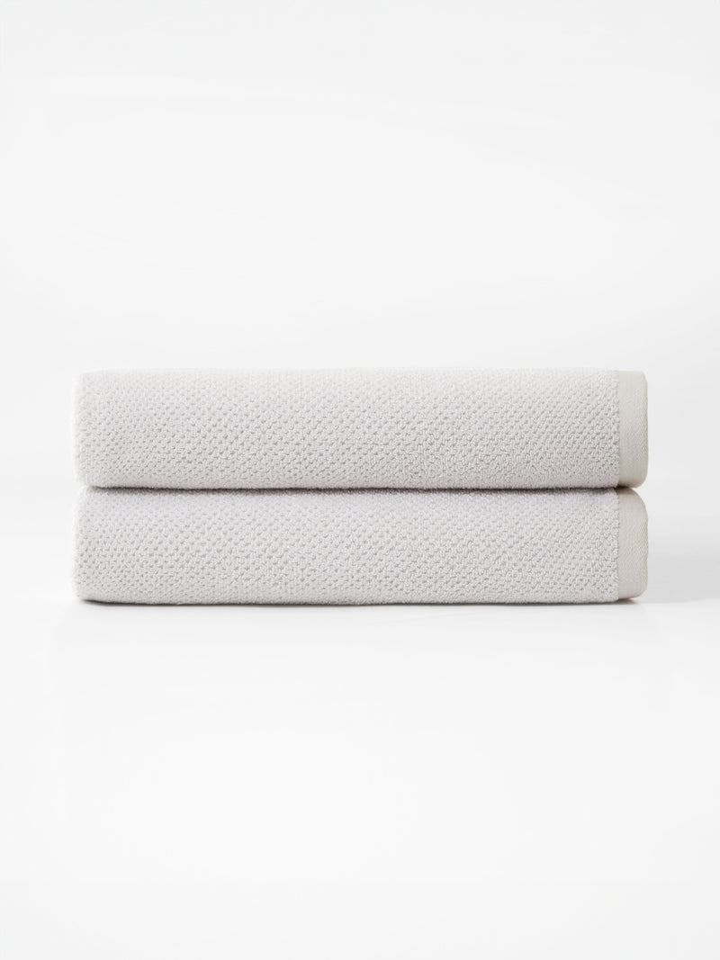 Nantucket Bath Towels in the color Heathered Light Grey. Photo of Nantucket Bath Towels taken with the bath towels on a white background.