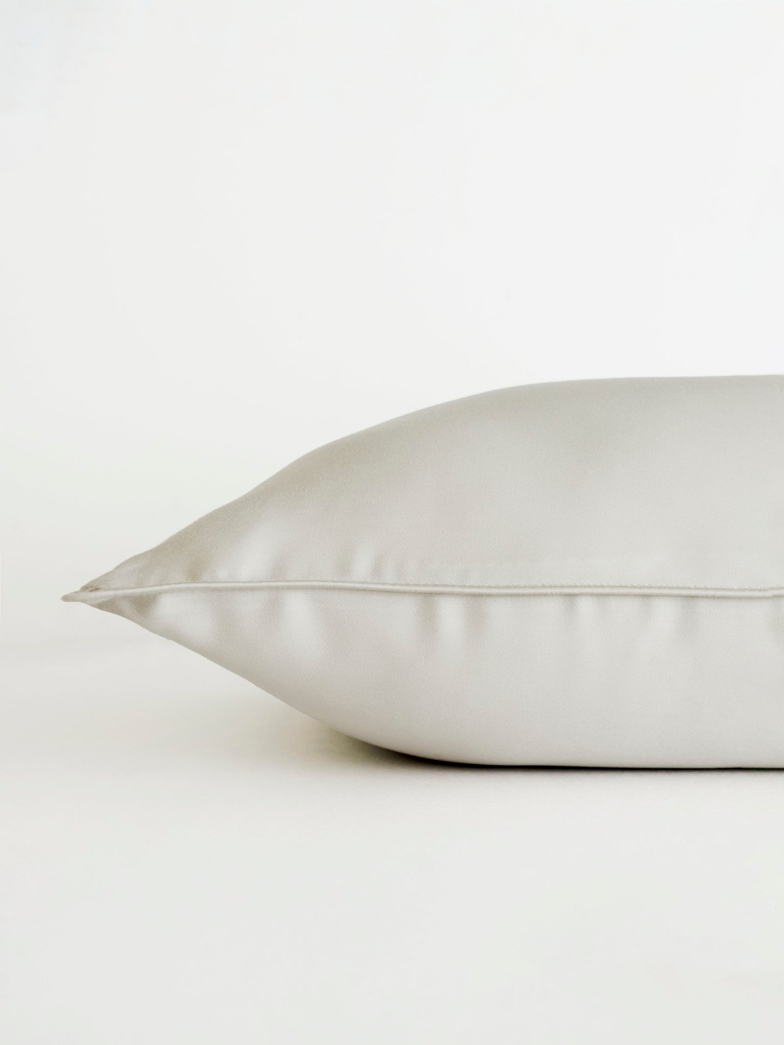 Light Grey travel pillowcase with white background 