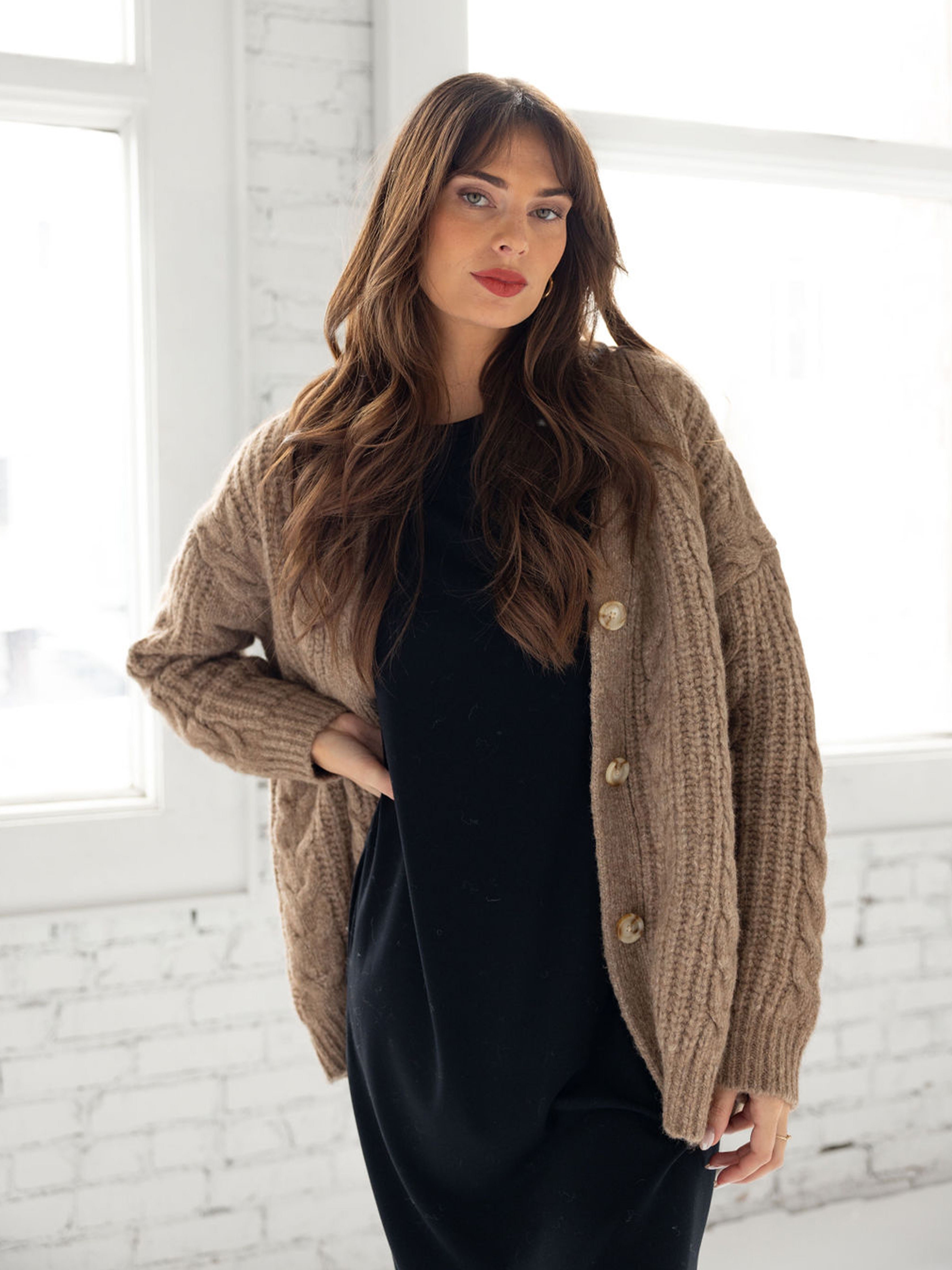 Woman wearing mushroom cardigan over black dress |Color:Mushroom