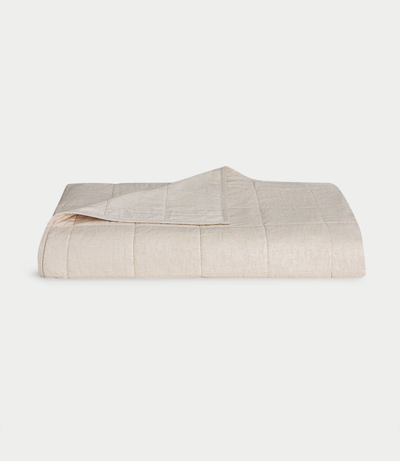 Natural  Linen Bamboo Box Quilt folded with white background.