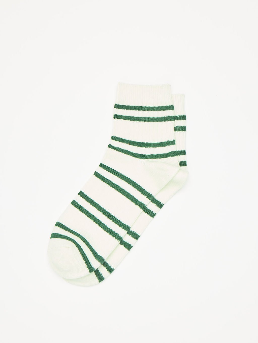 The Women's Sadie Sock by Cozy Earth, featuring green horizontal stripes, is displayed solo on a plain white background. |Color:Celadon/Jade