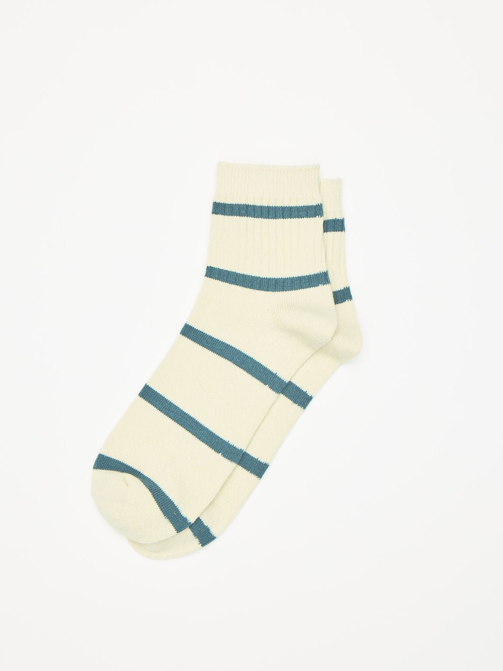 A pair of Women's Sadie Sock by Cozy Earth in cream with blue horizontal stripes, set against a plain white background. 