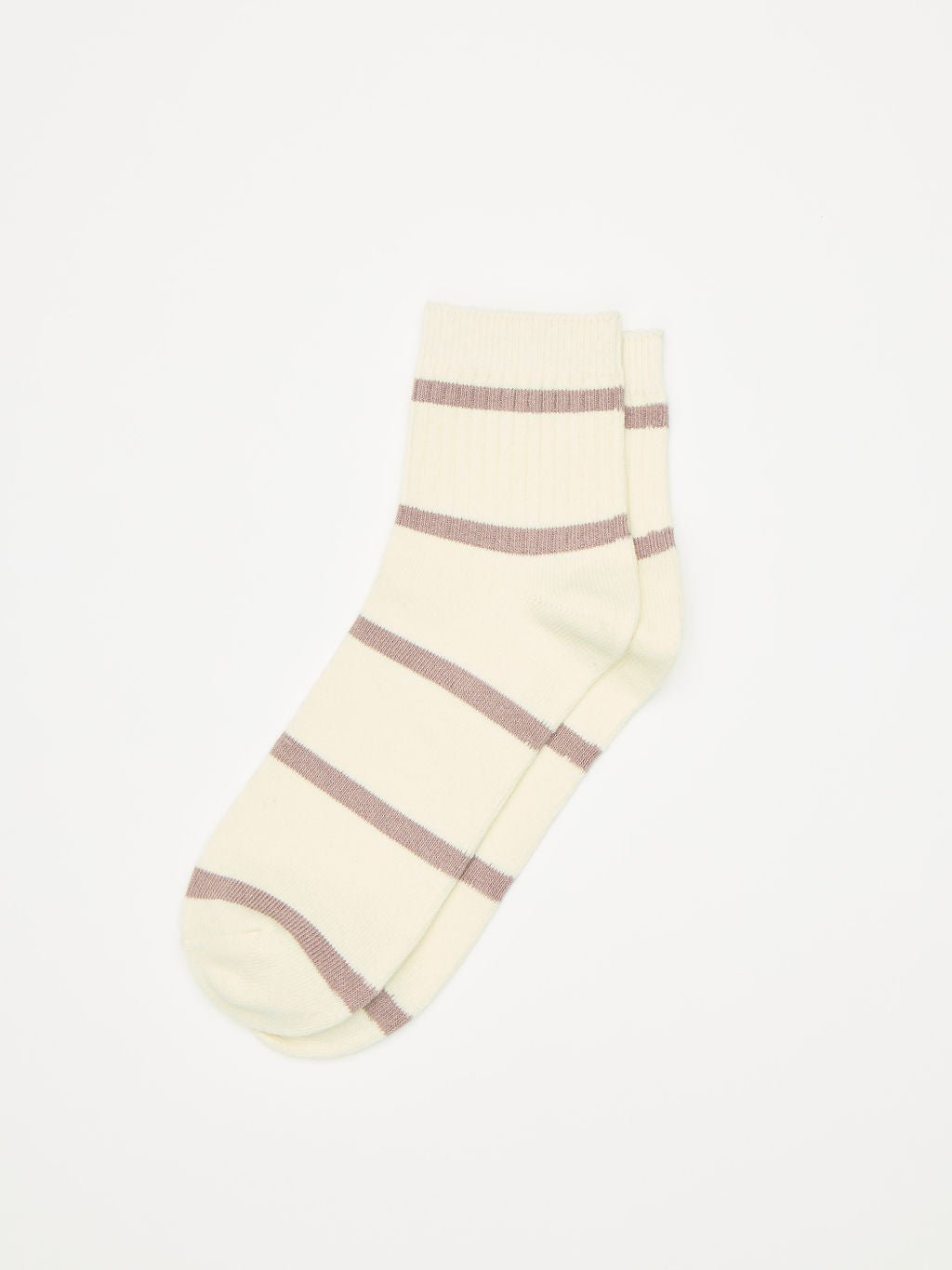 The Women's Sadie Sock by Cozy Earth, featuring a cream color with purple horizontal stripes and an ankle-length design, is displayed flat on a plain white background. |Color:Parchment/Dusty Orchid