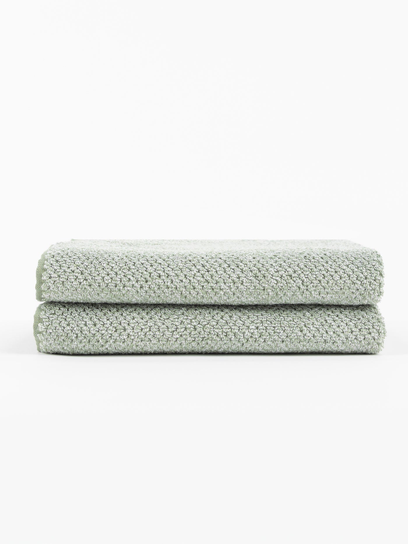 A pair of Nantucket Bath Towels in Heathered Clay are stacked. |Color:Heathered Sage