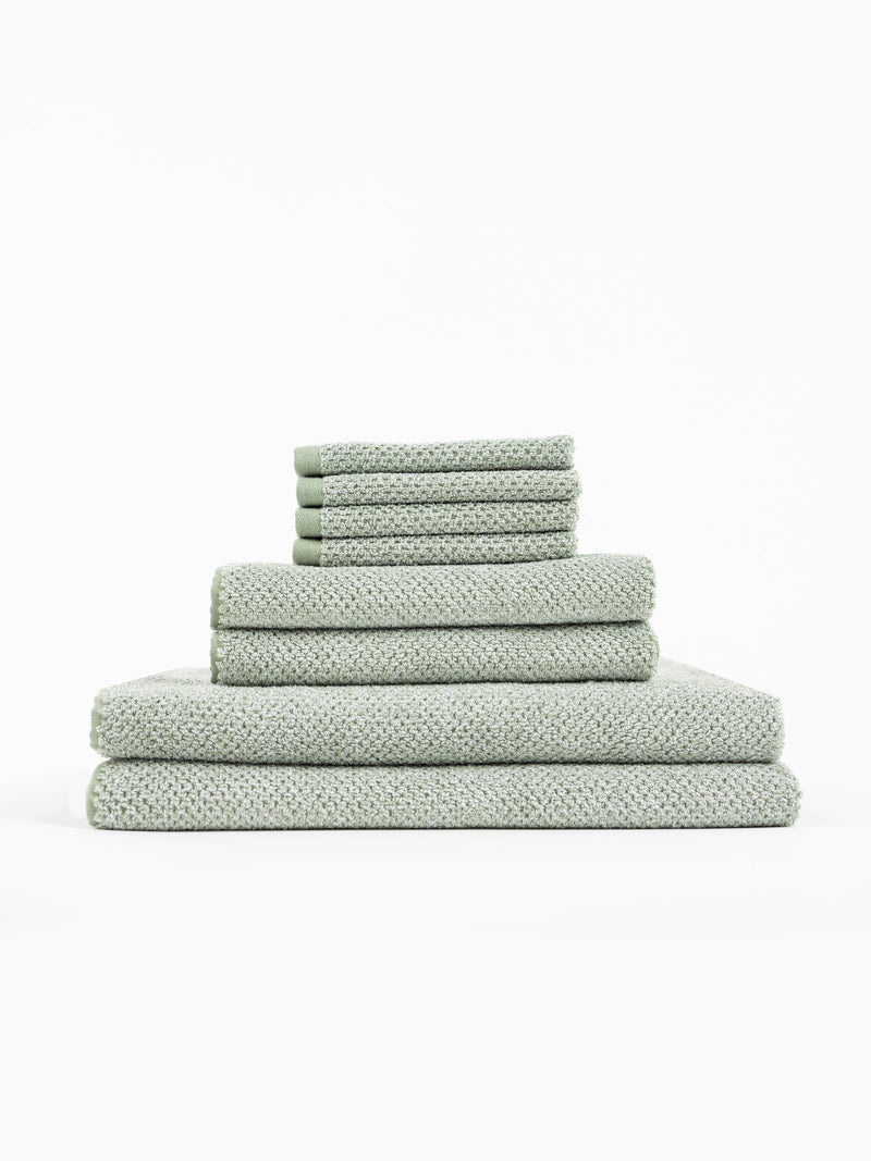 A stack of Nantucket Bath Towels sit in front of a white background.
