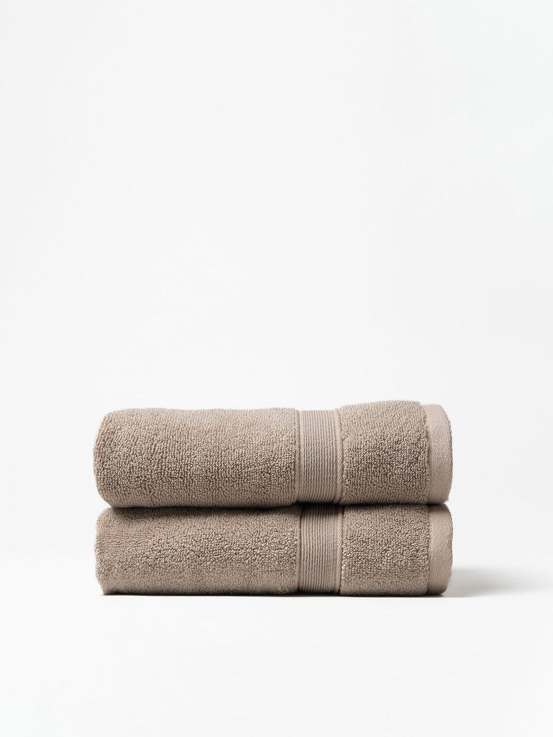 Sand hand towels folded with white background