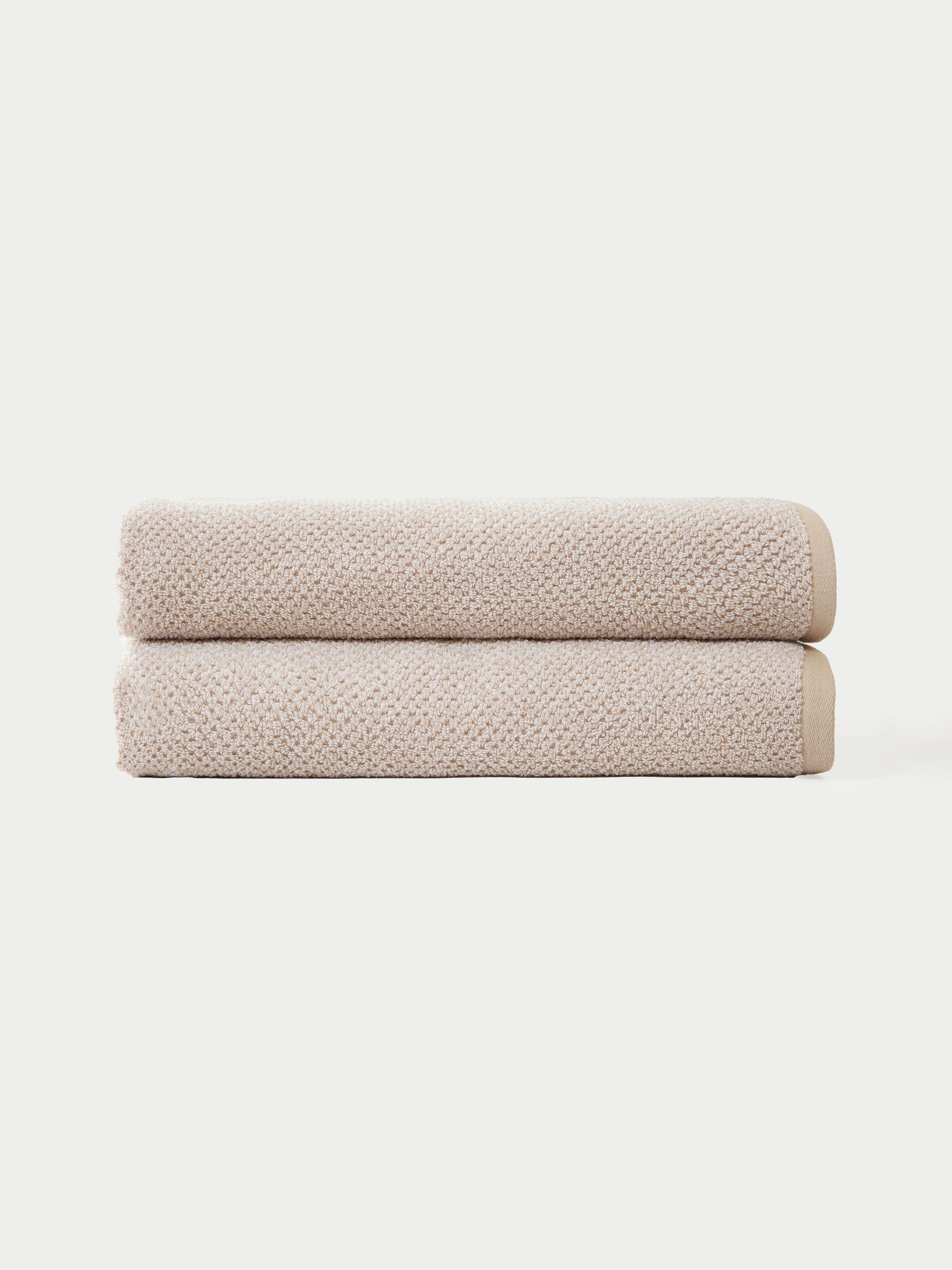 Nantucket Bath Sheets in the color Heathered Sand. The bath sheets are neatly folded. The photo of the bath sheets was taken with a white background.|Color:Heathered Sand