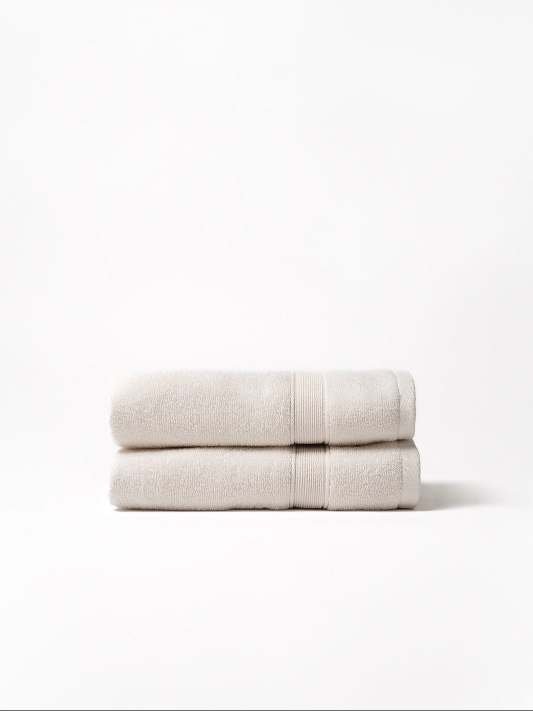 Seashell hand towels folded with white background 