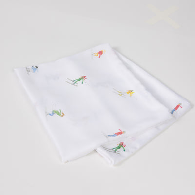 Two folded pillowcases with skiers on them standard/king/body