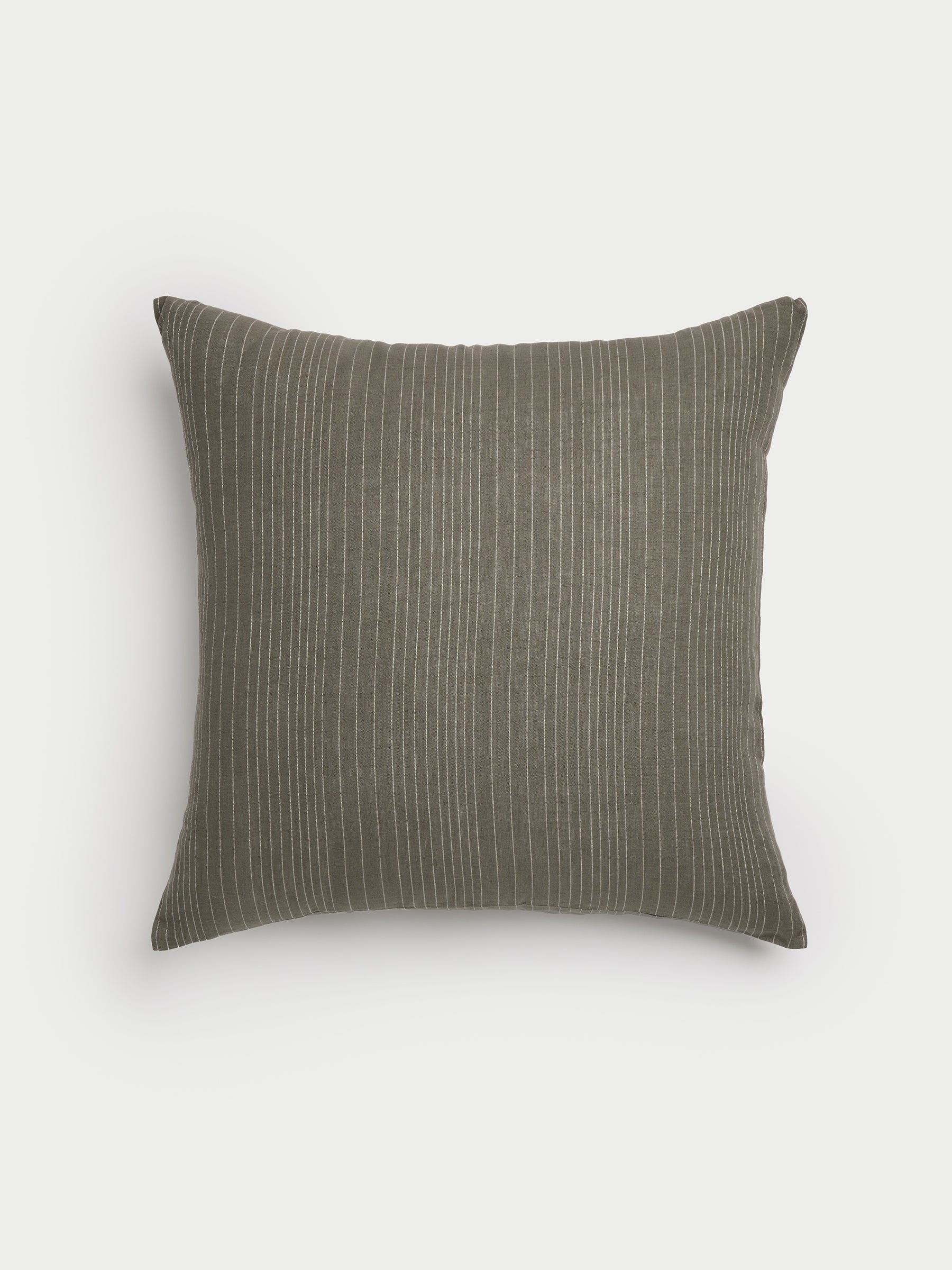 Cozy Earth striped throw pillow with plain white background 