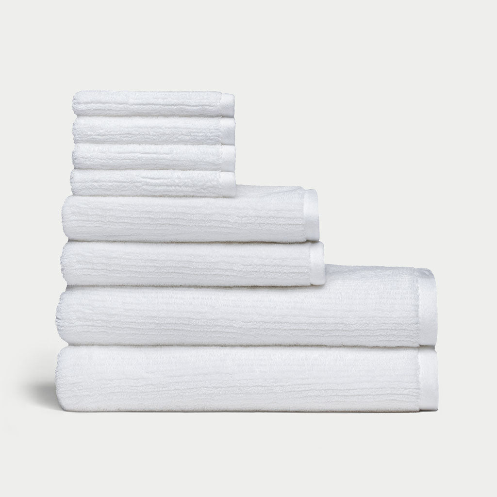 Ribbed Terry Bath Towel Set in the color White. Photo of Ribbed Terry Bath Towel Set taken with a white background. 