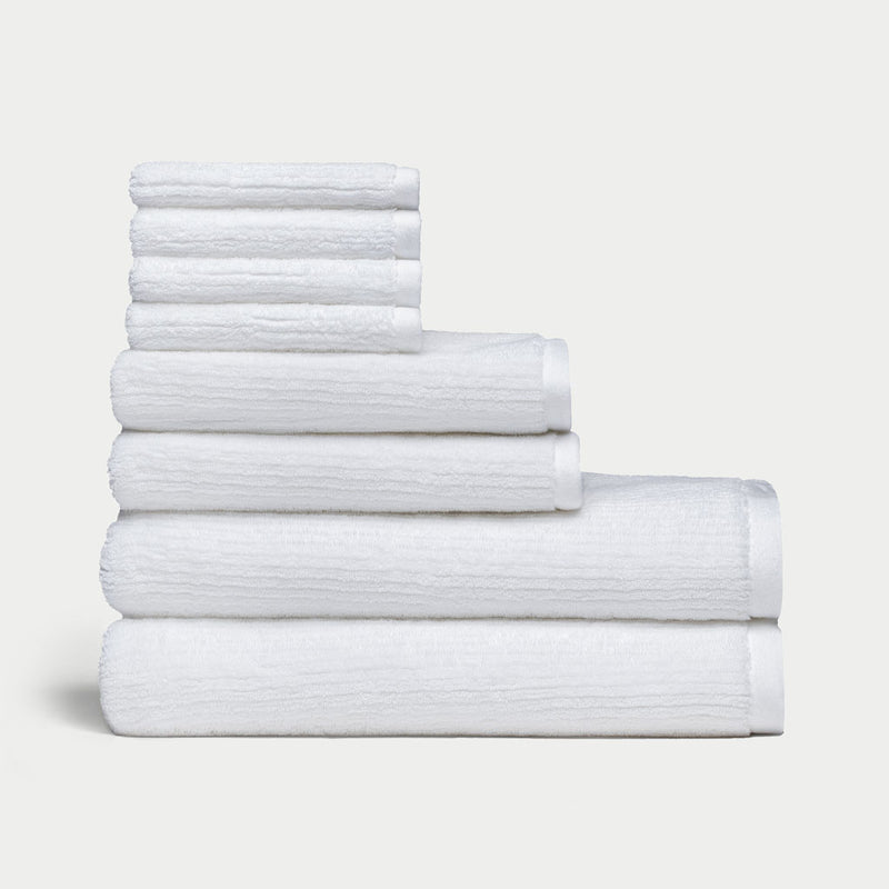 Ribbed Terry Bath Towel Set in the color White. Photo of Ribbed Terry Bath Towel Set taken with a white background.