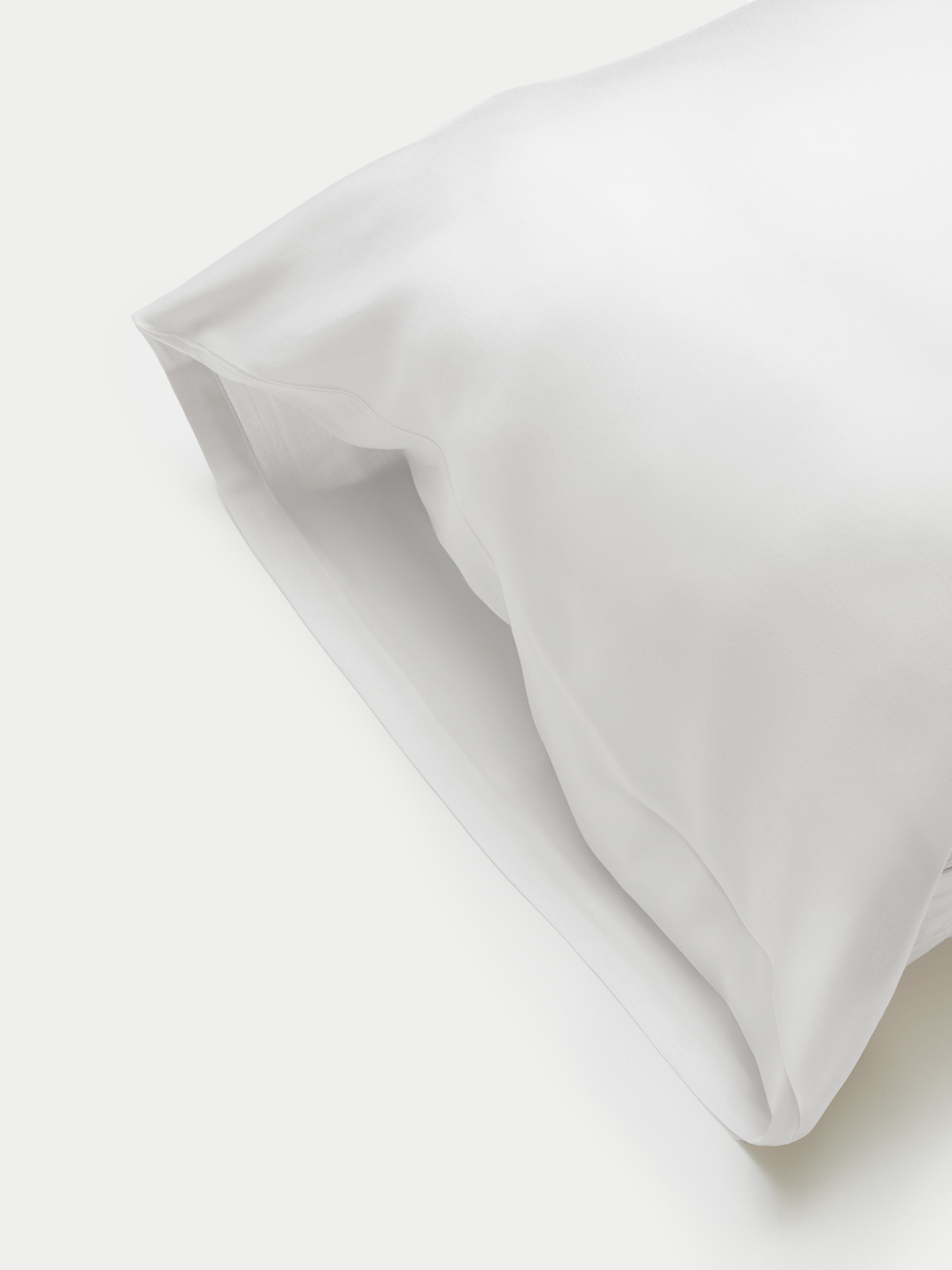Side of white body pillowcase with plain background 