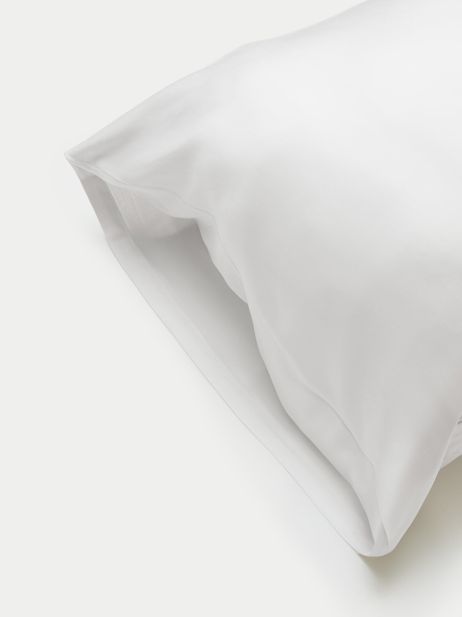 Side of white body pillowcase with plain background