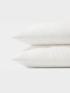 White linen Puckered Shams photographed over white background. | Color: White