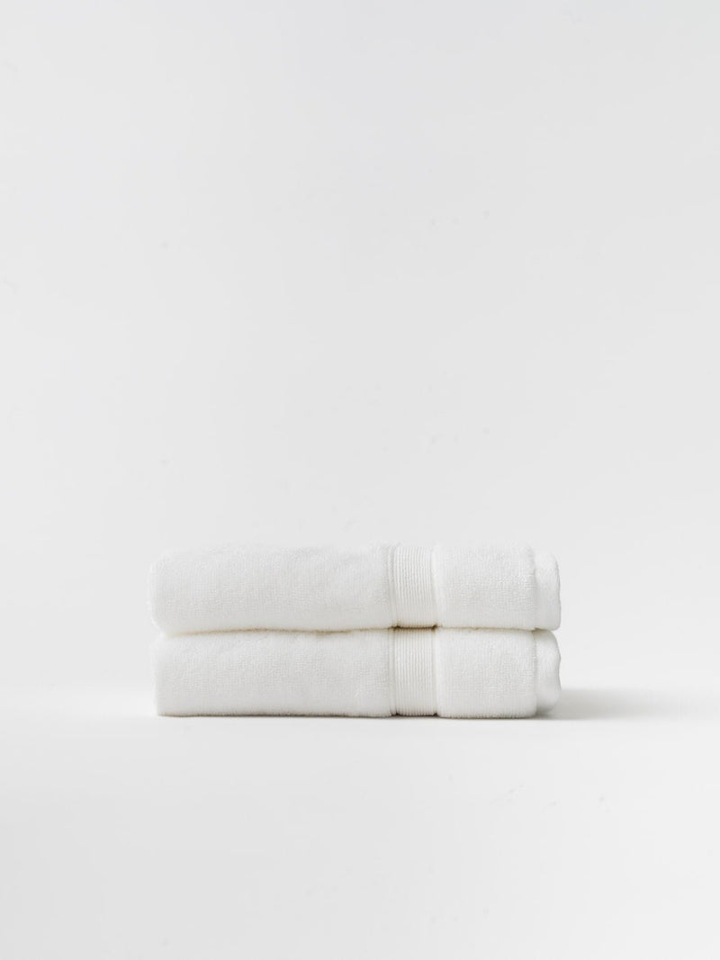 White hand towels folded with white background