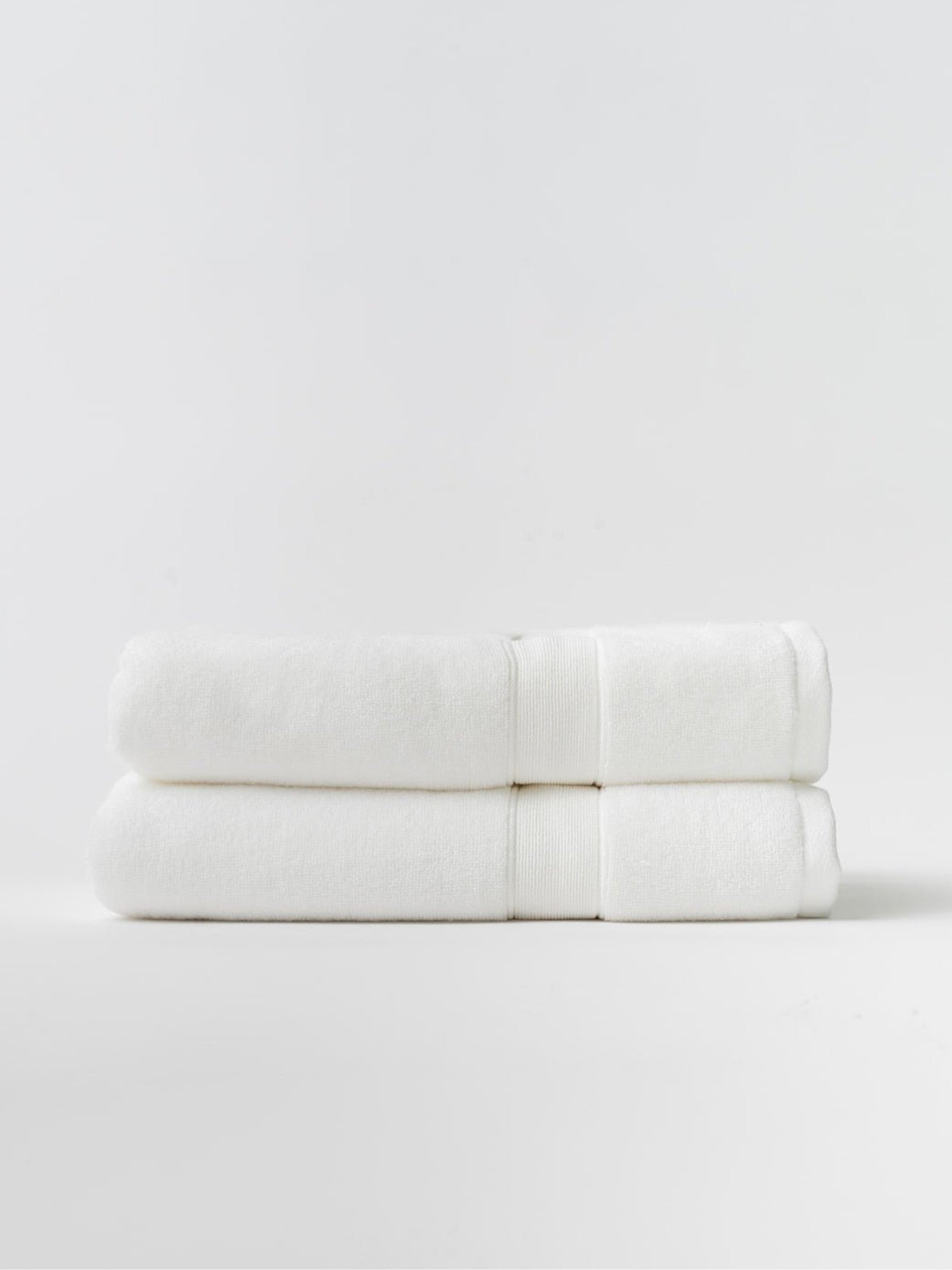 White luxe bath towels folded with white background |Color:White