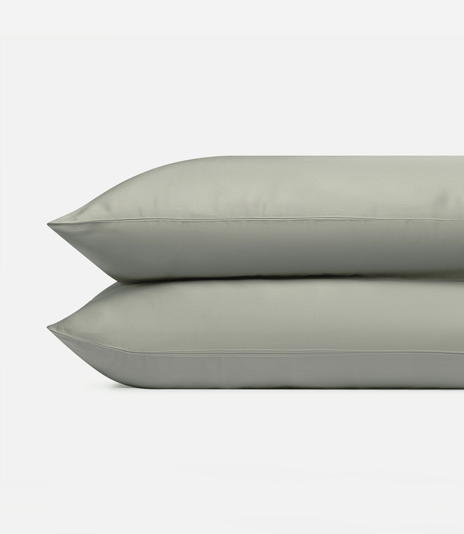 Two sage pillowcases with a plain background standard/king/body
