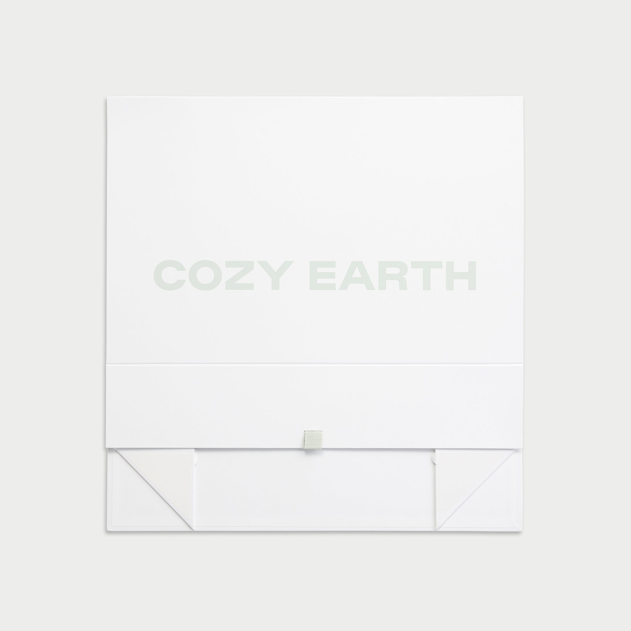 Closed and flattened cozy earth gift box 