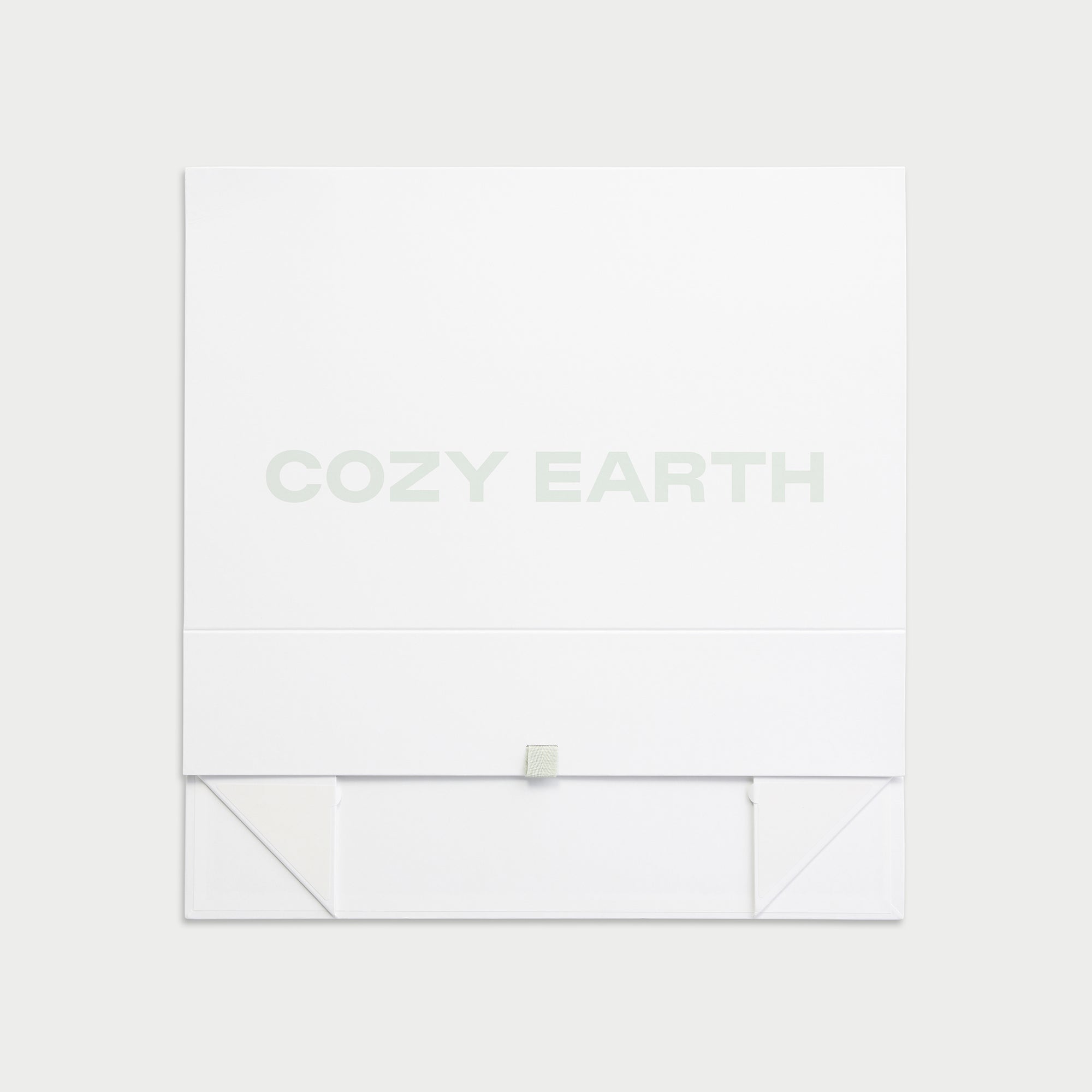 Closed and flattened cozy earth gift box 