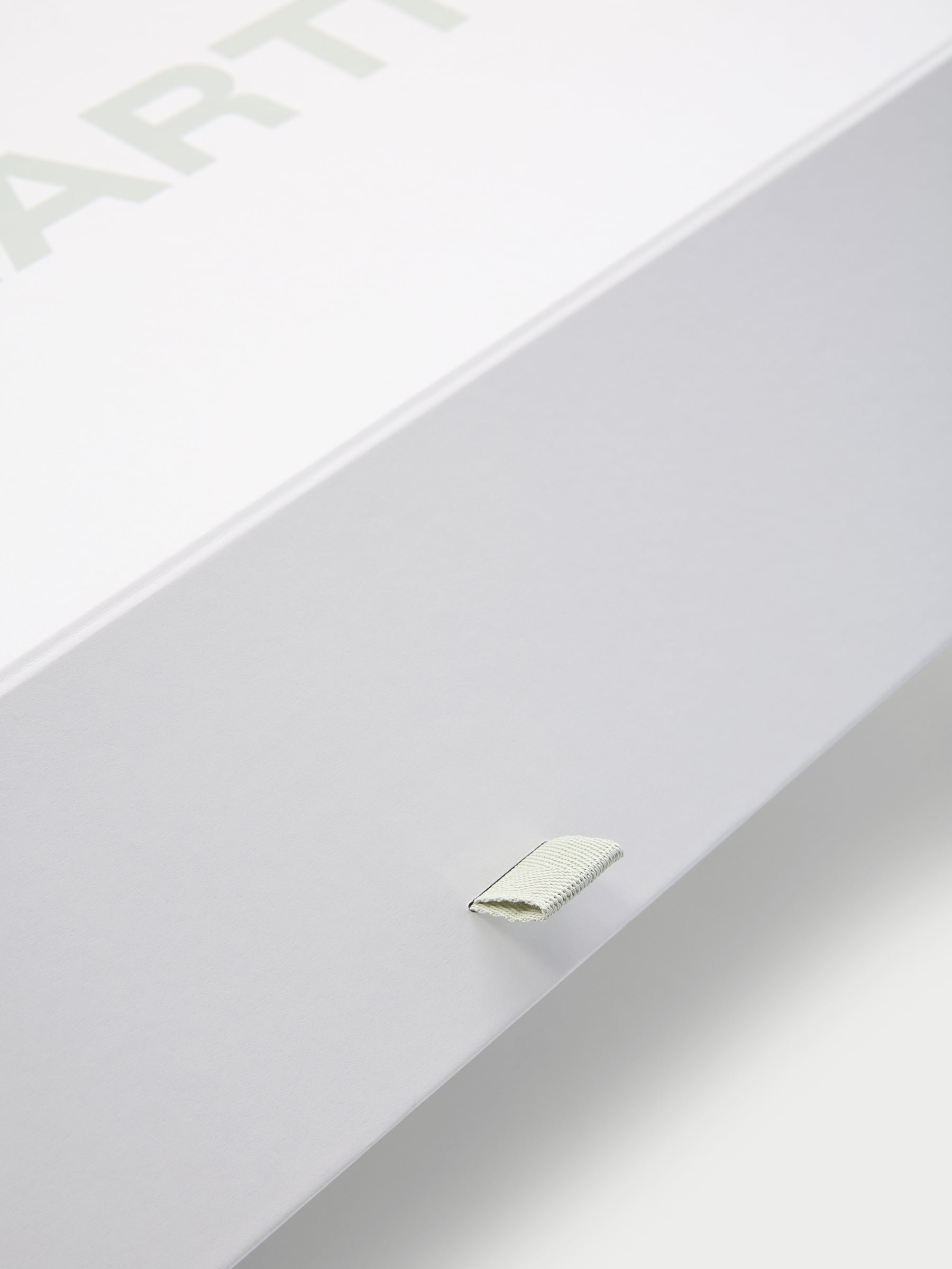 Close up of tab on gift box 