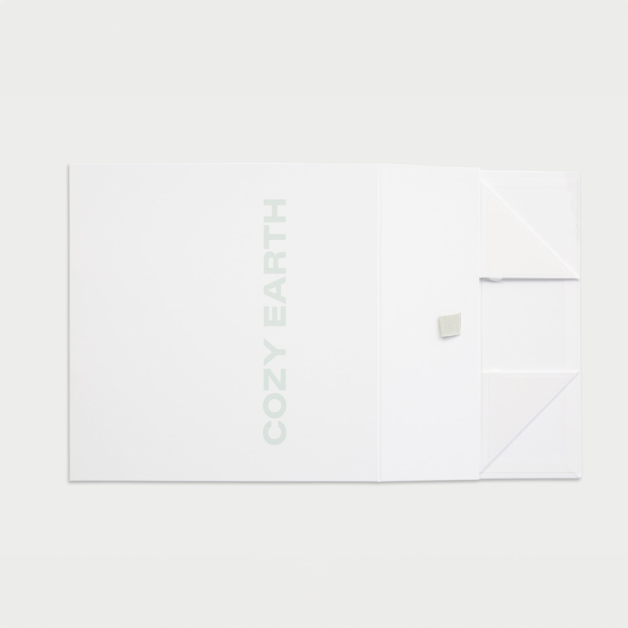 Flattened but closed gift box 