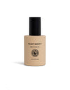 A beige bottle labeled "Cozy Earth Brightening Vitamin C Oil" with a black cap sits on a white background