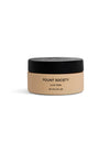 A beige jar with a black lid labeled "Cozy Earth Clay Mask" (59.1 ml, 2 fl oz) sits on a plain white background.