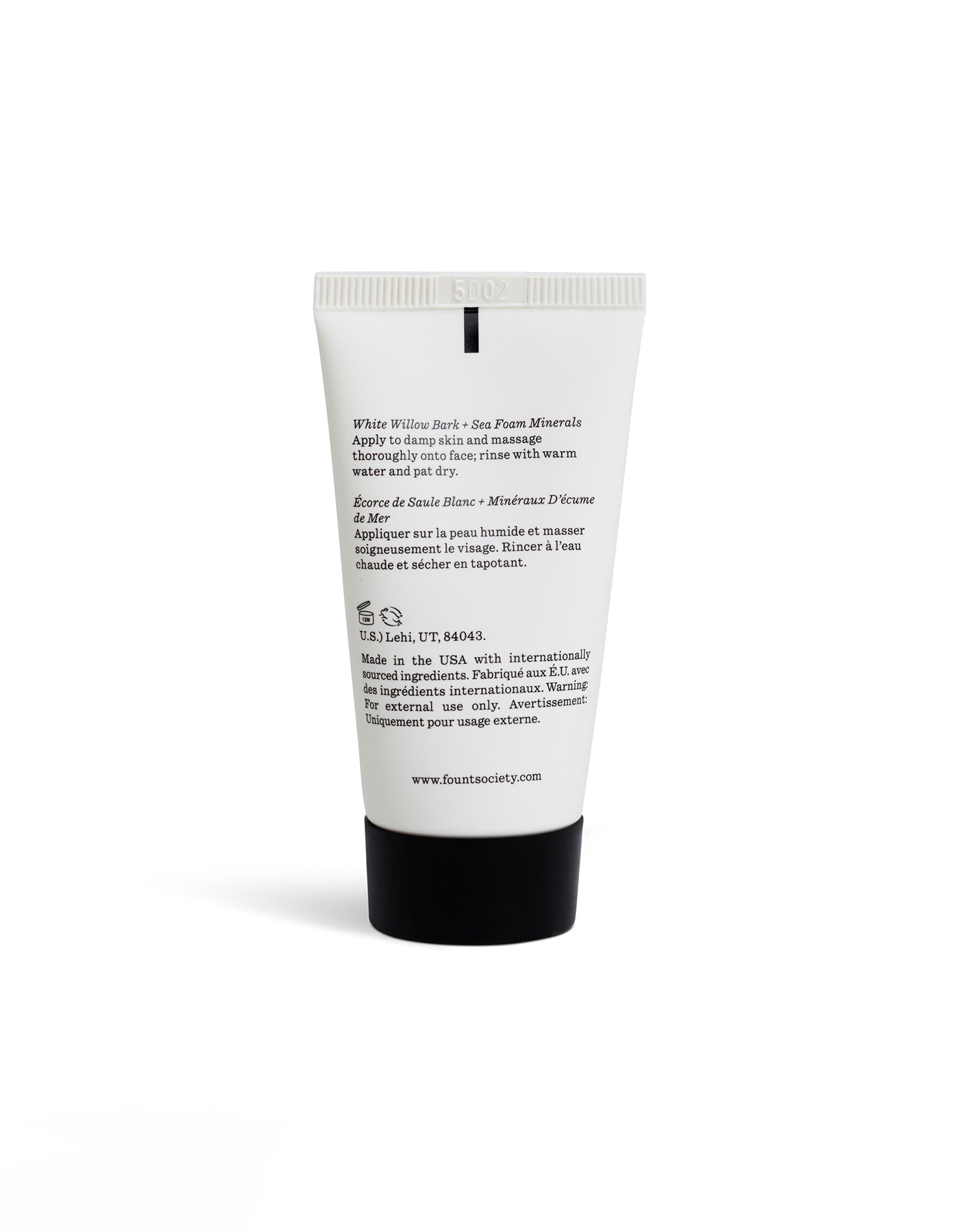 A white tube of Cozy Earth Gel Cleanser stands upright on a white background, featuring black text on the back detailing ingredients and usage instructions.  