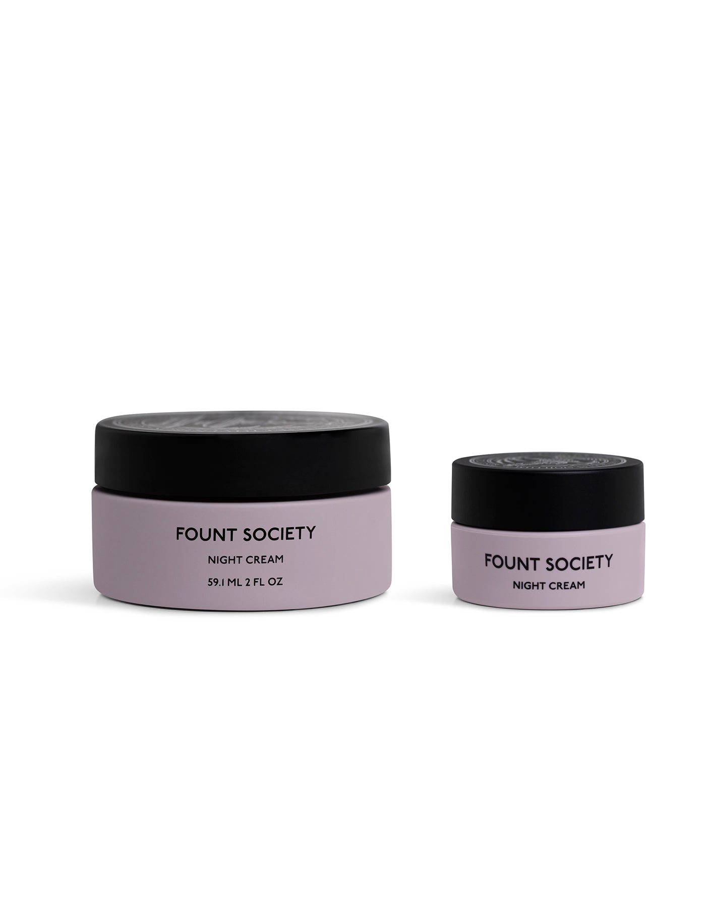 Two lavender jars of Cozy Earth Night Cream with black lids—one large (59 ml/2 fl oz) and one smaller—are side by side on a white background.