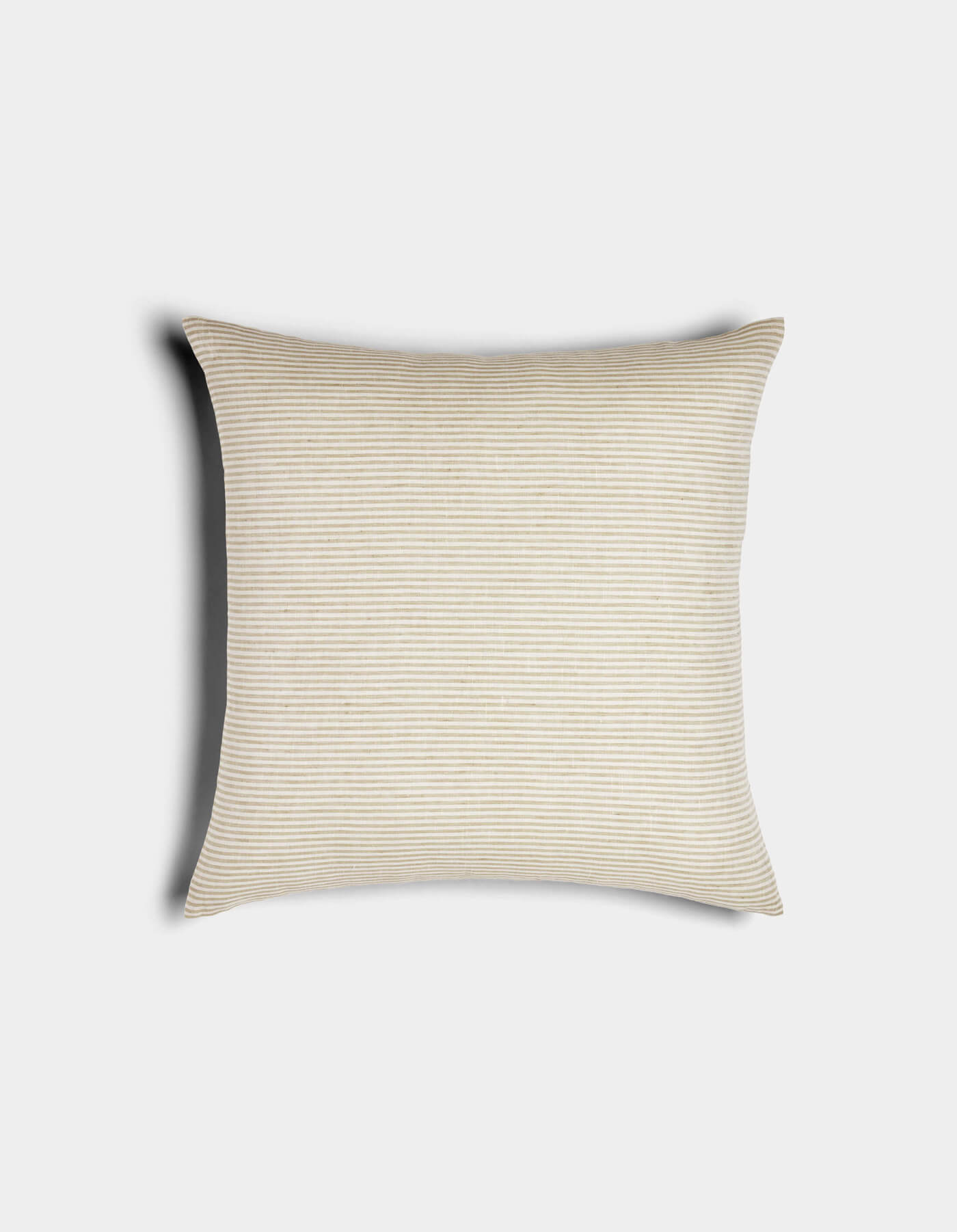 The Cozy Earth Striped Throw Pillow features thin beige and white horizontal stripes. Soft and neatly shaped, it is displayed against a plain white background.