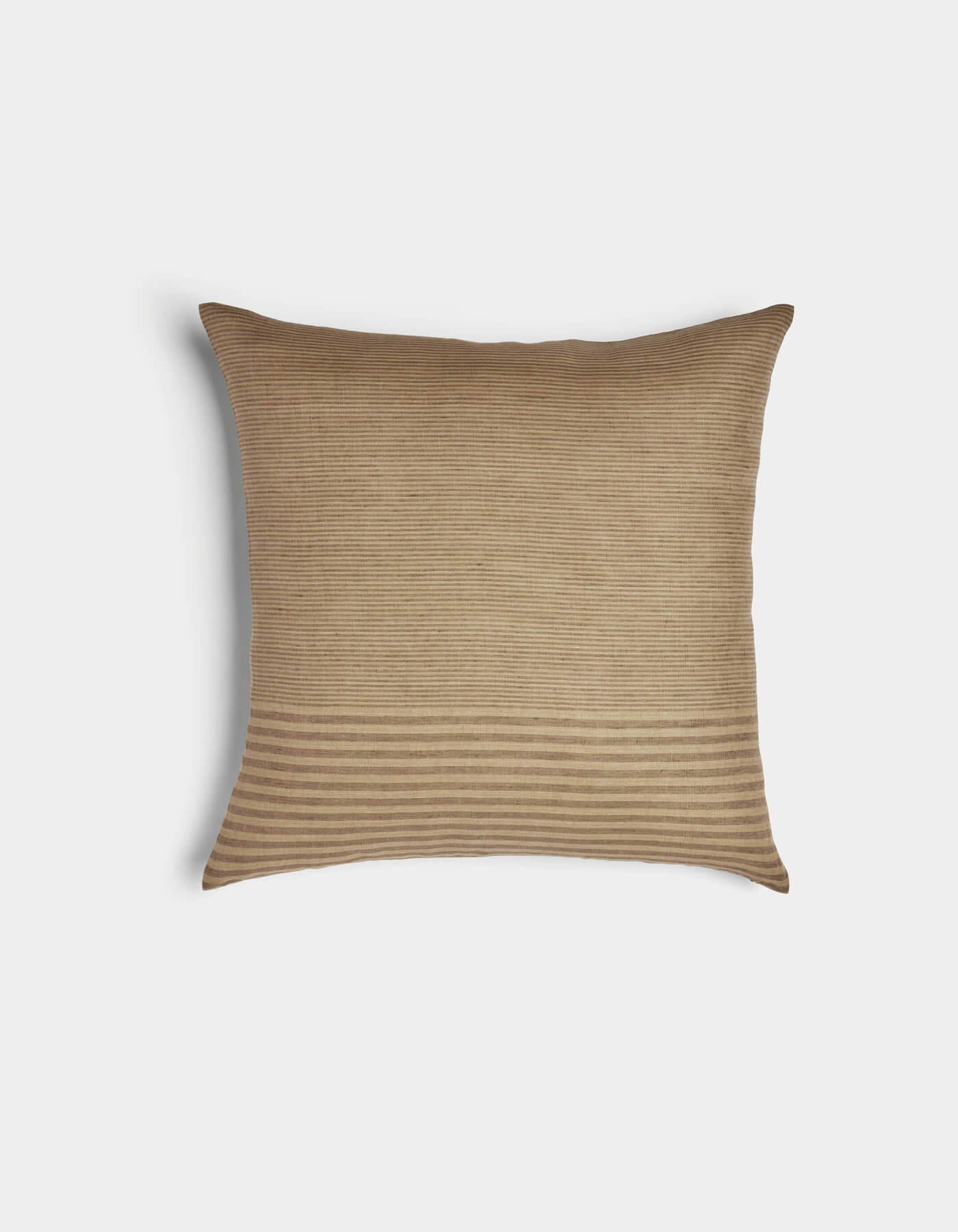 The Cozy Earth Striped Throw Pillow is a rectangular beige pillow with subtle horizontal stripes—finer at the top and thicker at the bottom—shown against a plain white background.