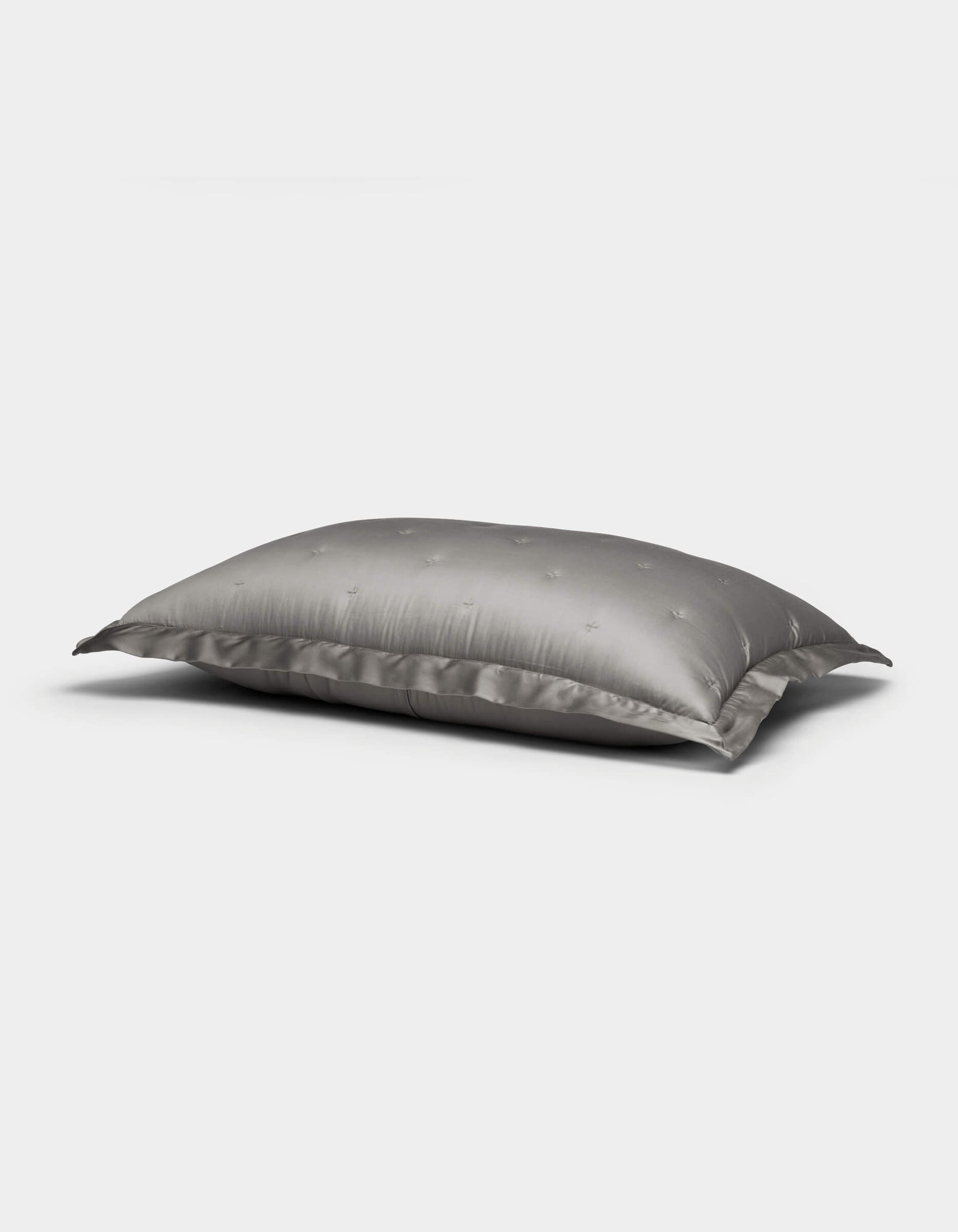 A single Cozy Earth Bamboo Quilted Sham in gray with a subtle star pattern is displayed on a plain white background.