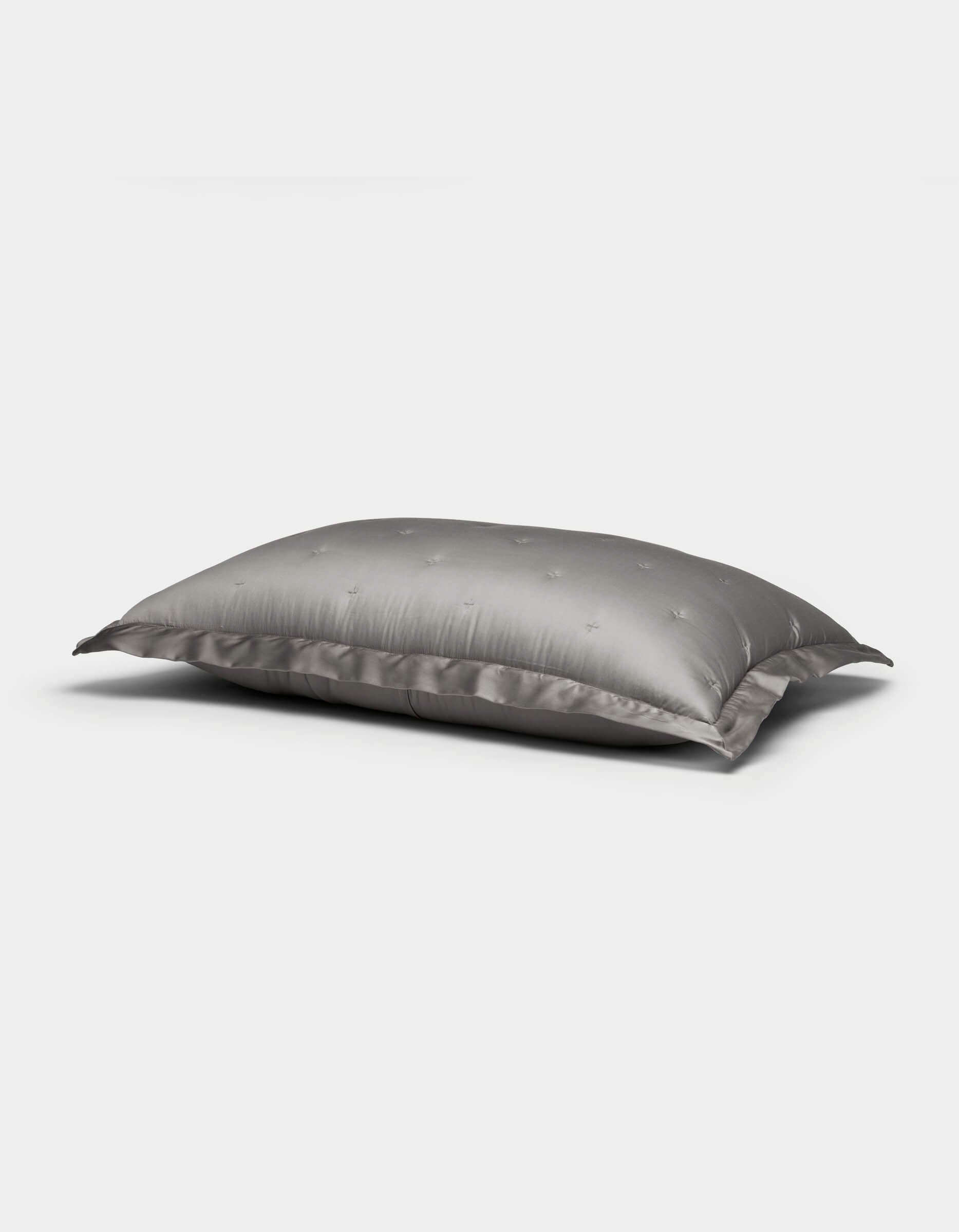 A single Cozy Earth Bamboo Quilted Sham in gray with a subtle star pattern is displayed on a plain white background.