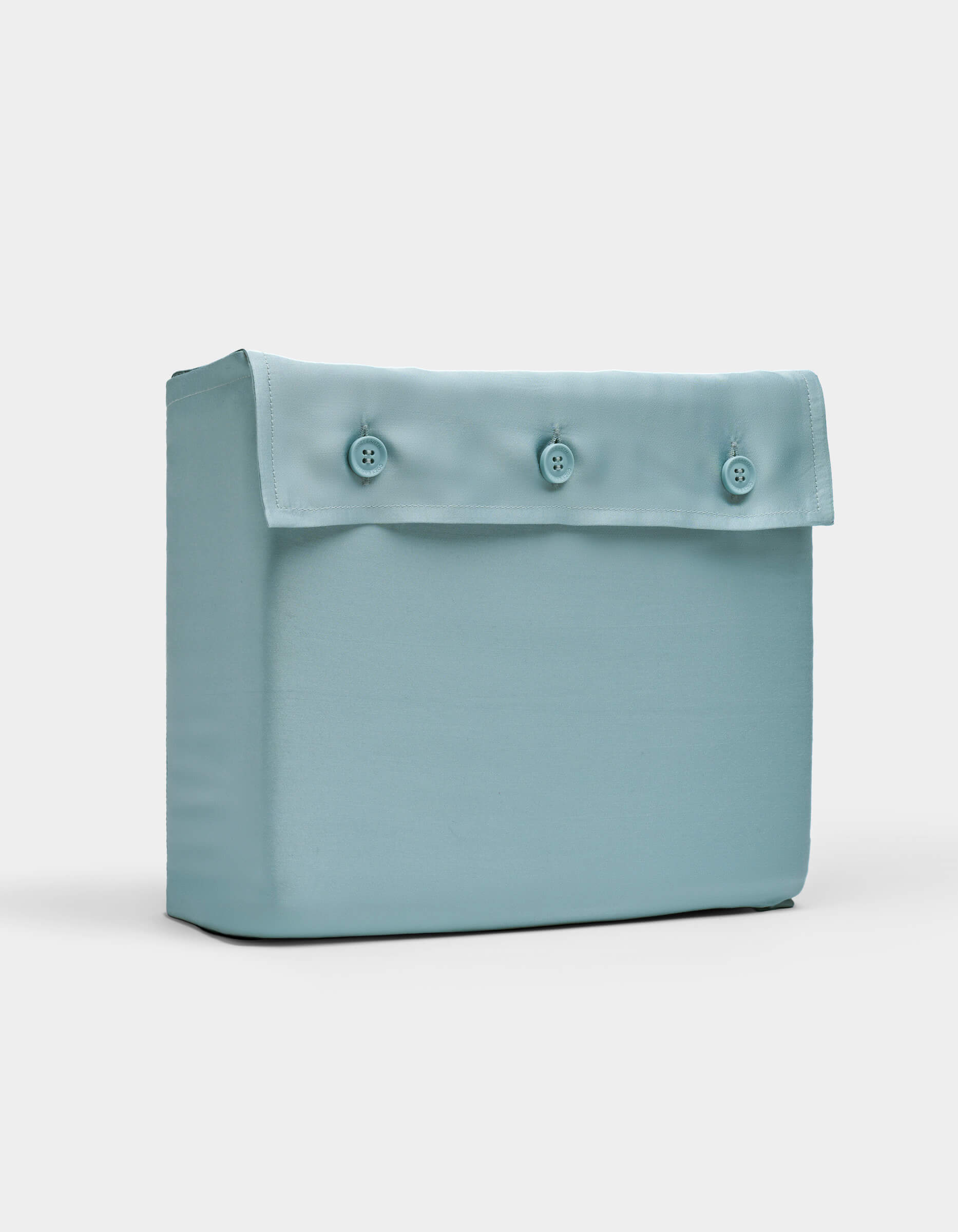 A Cozy Earth Bamboo Sheet Set, neatly folded in a light blue rectangular fabric pouch with a flap secured by three matching buttons, displayed against a plain white background.