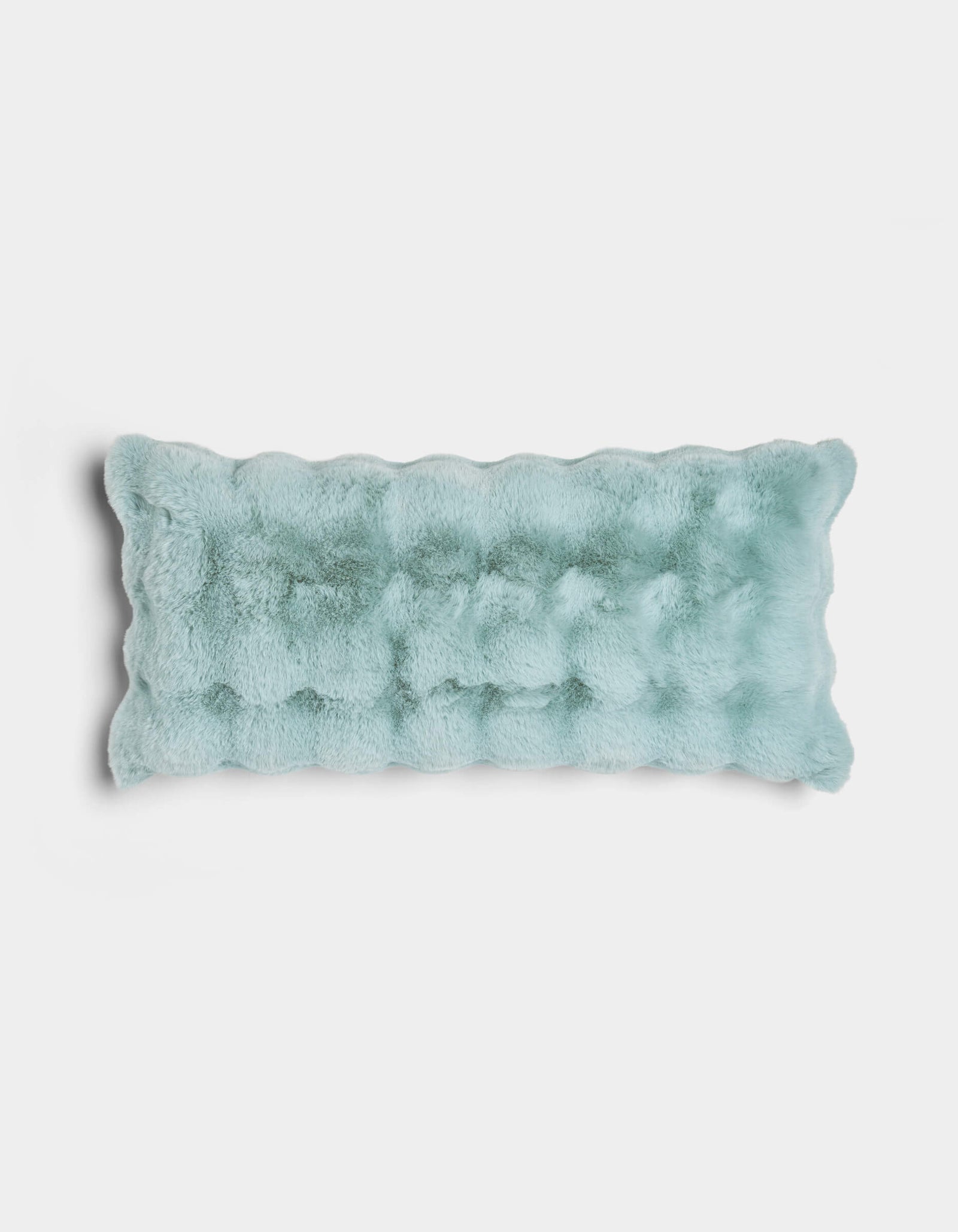 The Cozy Earth Bubble Cuddle Pillow is a rectangular, light blue plush pillow with a soft, fuzzy texture, displayed against a plain white background.